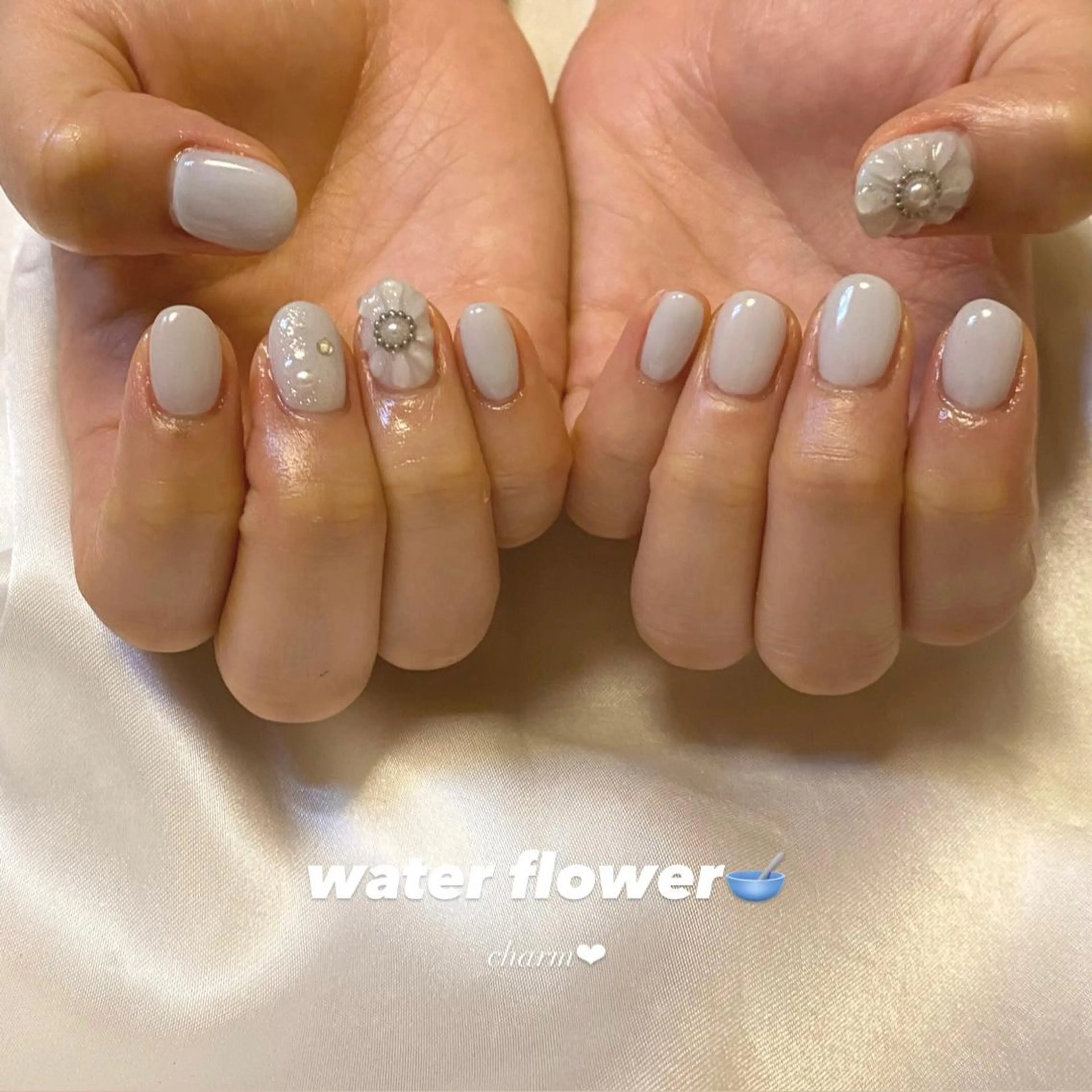 ネイル フラワーネイル 水色 パステルネイル ぷっくりネイル ハンドネイル nail salon charmのネイルデザイン