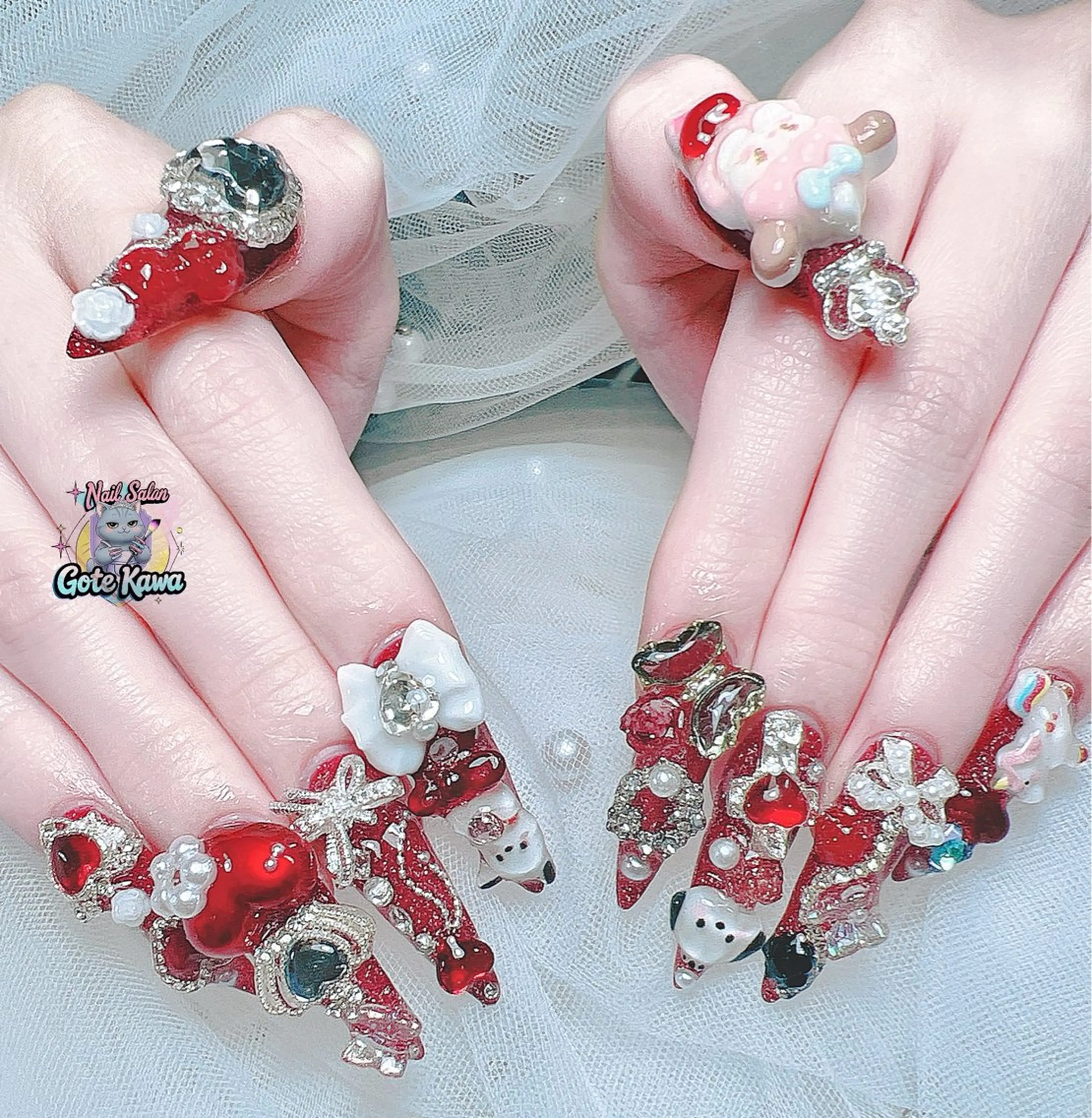 ネイル アートネイル 長さ出し キラキラネイル ピンク リボン ハンドネイル ハンドケア GOTE KAWA Nail Salon(ゴテかわ)所属・Gote Kawa nail salonのネイルデザイン