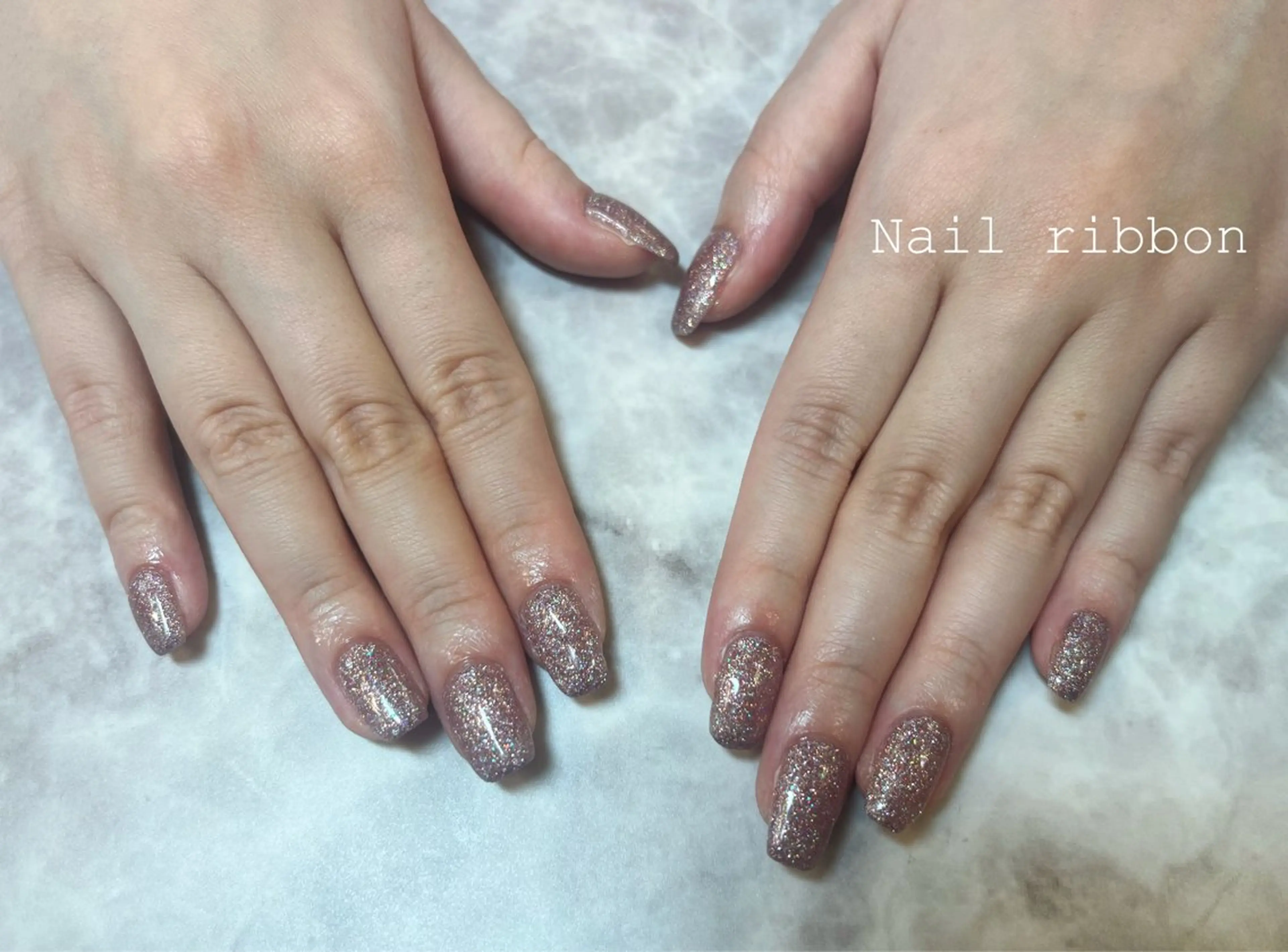 ネイル キラキラネイル ワンカラーネイル ピンク ネイルリボン 笠井のネイルデザイン
