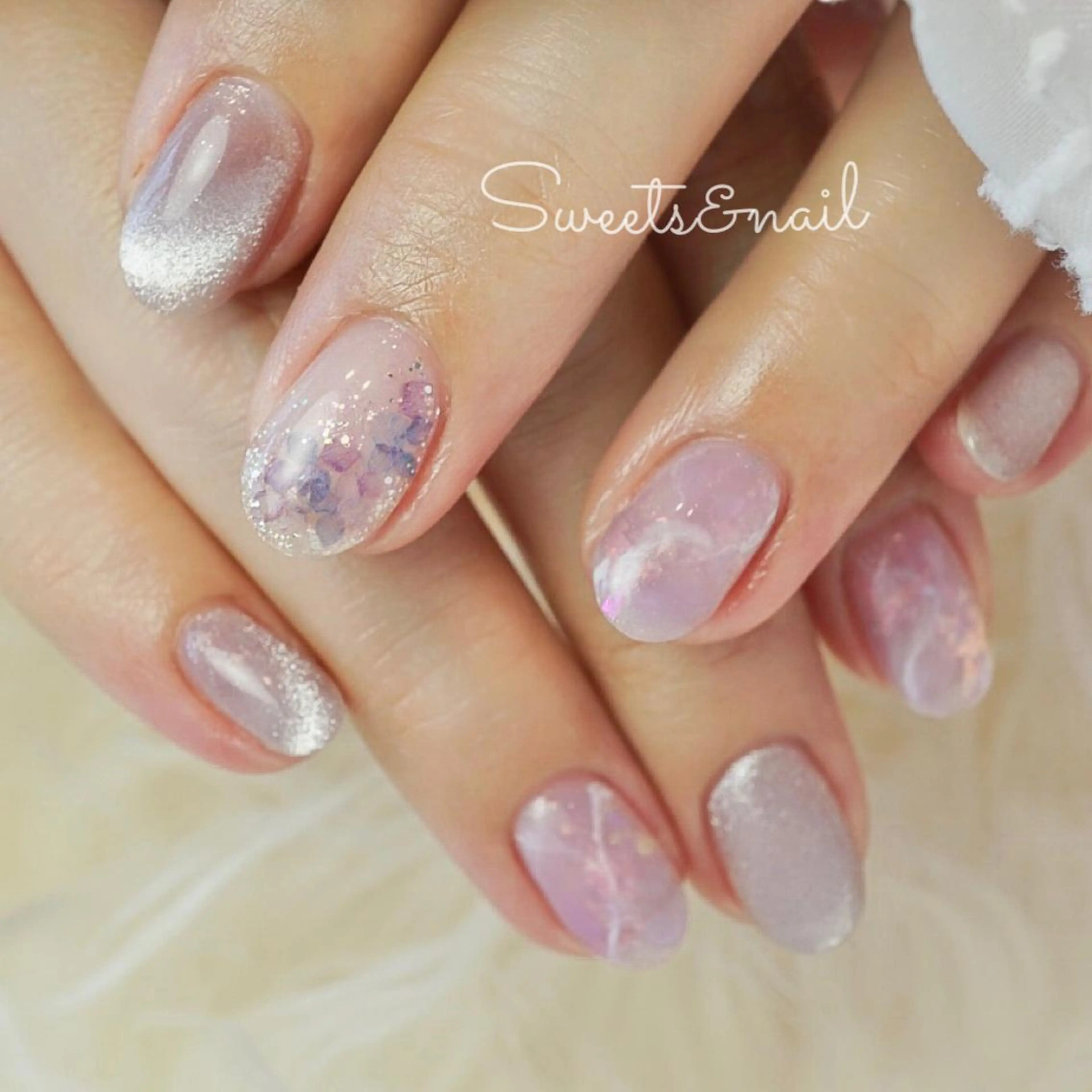 ネイル キラキラネイル マグネットネイル 大理石ネイル(マーブル) オフィスネイル パープル Sweets &nailのネイルデザイン