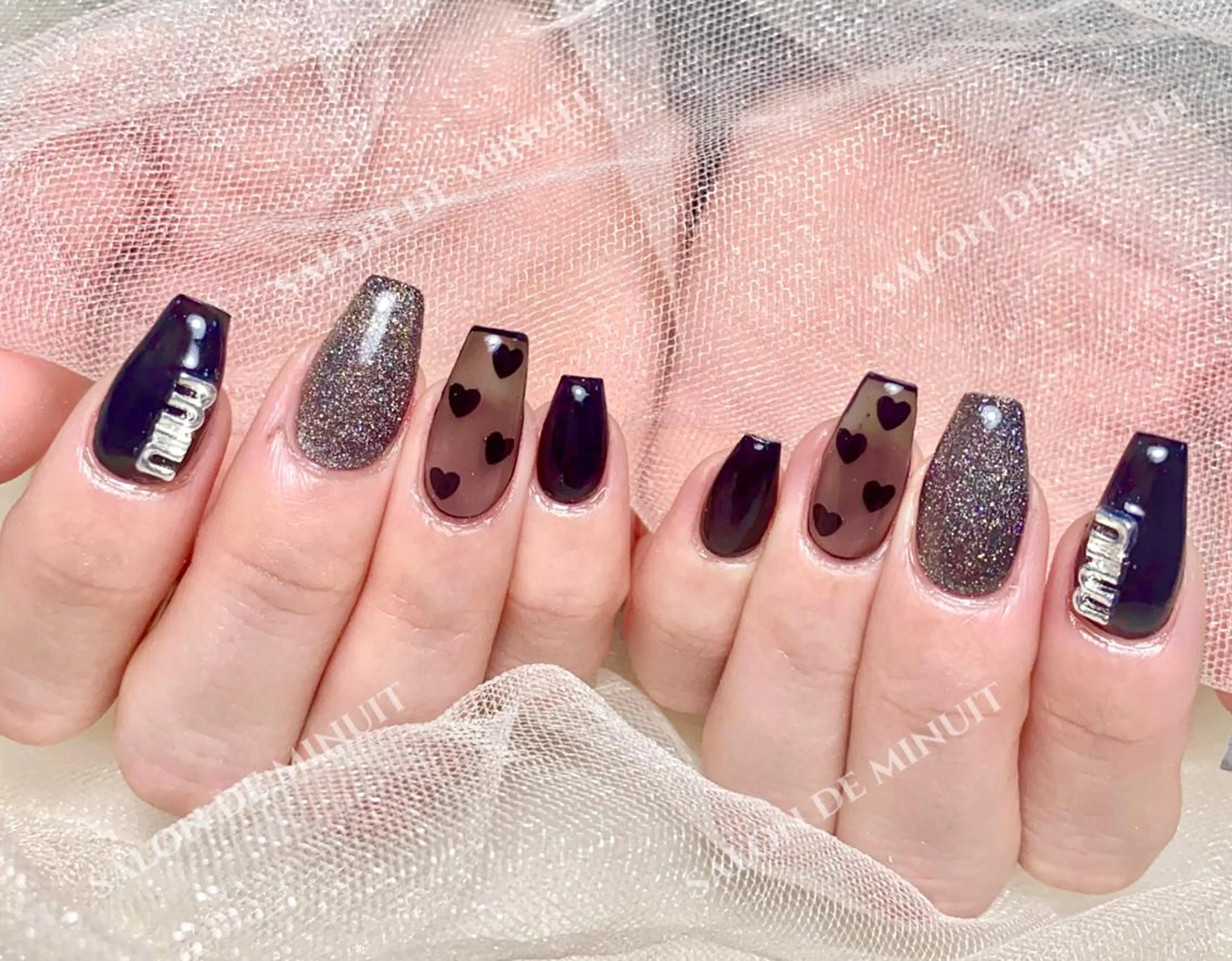 ネイル Salon de Minuit🦩のネイルデザイン