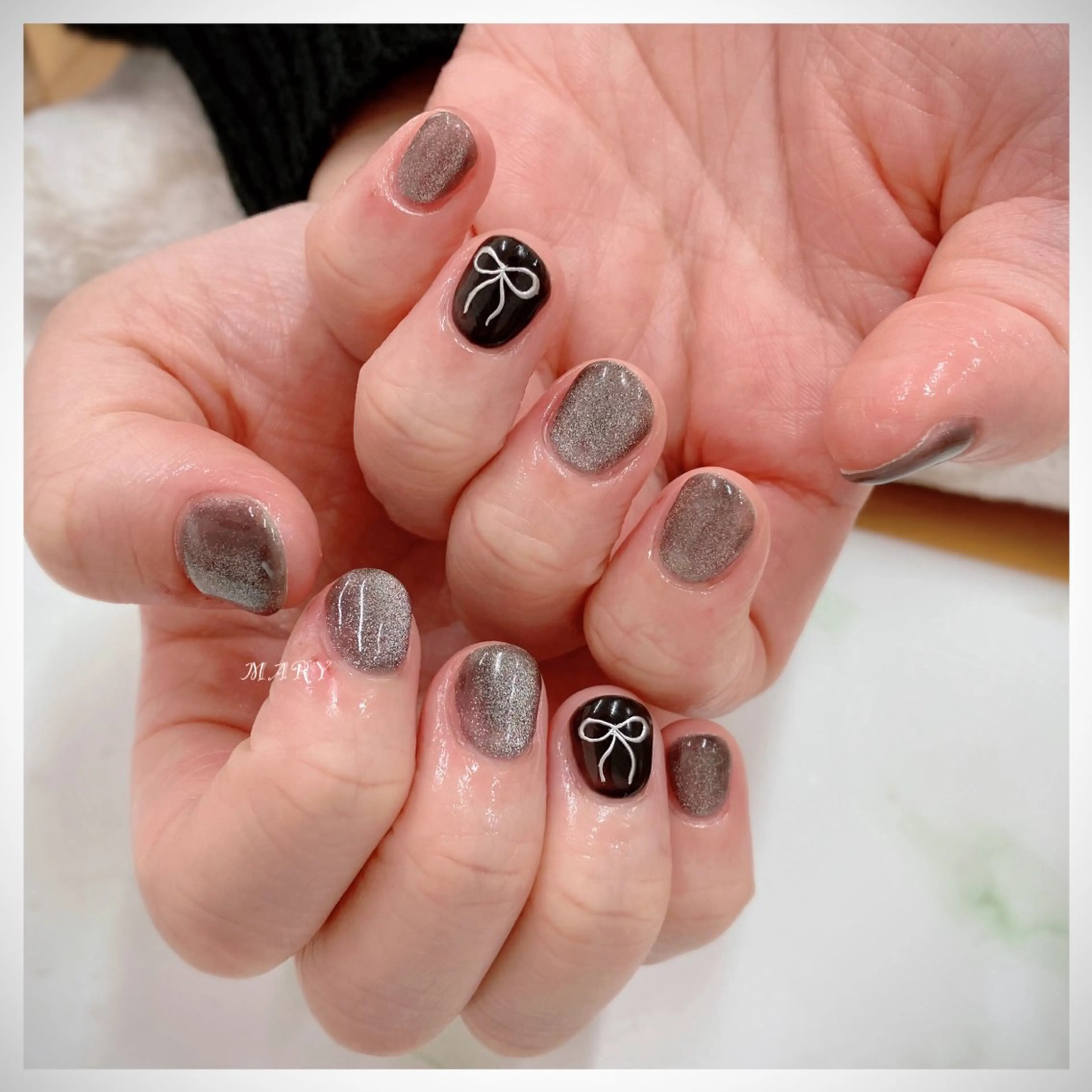 ネイル アートネイル マグネットネイル ニュアンスネイル ワンカラーネイル リボン Mary nail所属・Mary nail .narumiのネイルデザイン