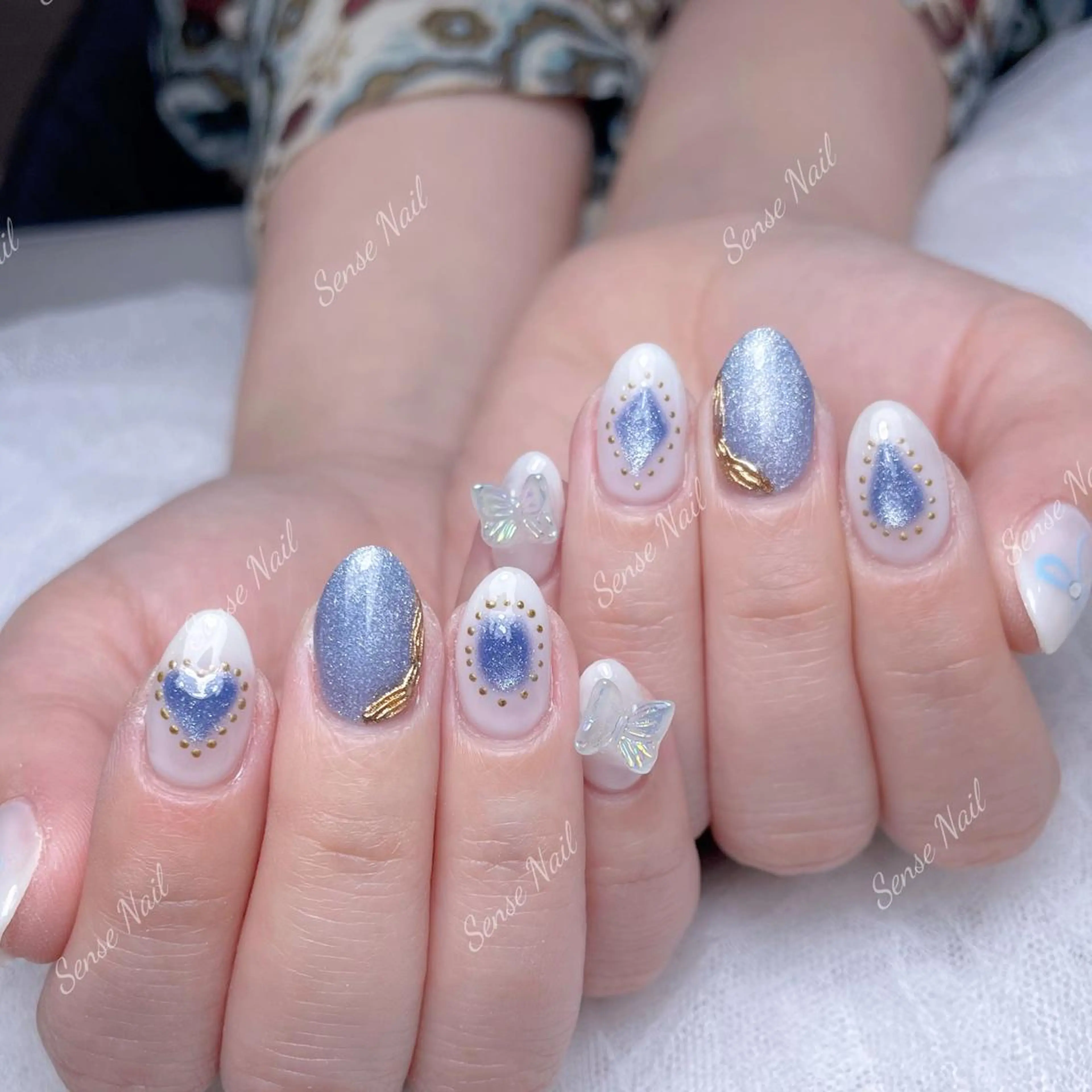 ネイル Queenie 🦋のネイルデザイン