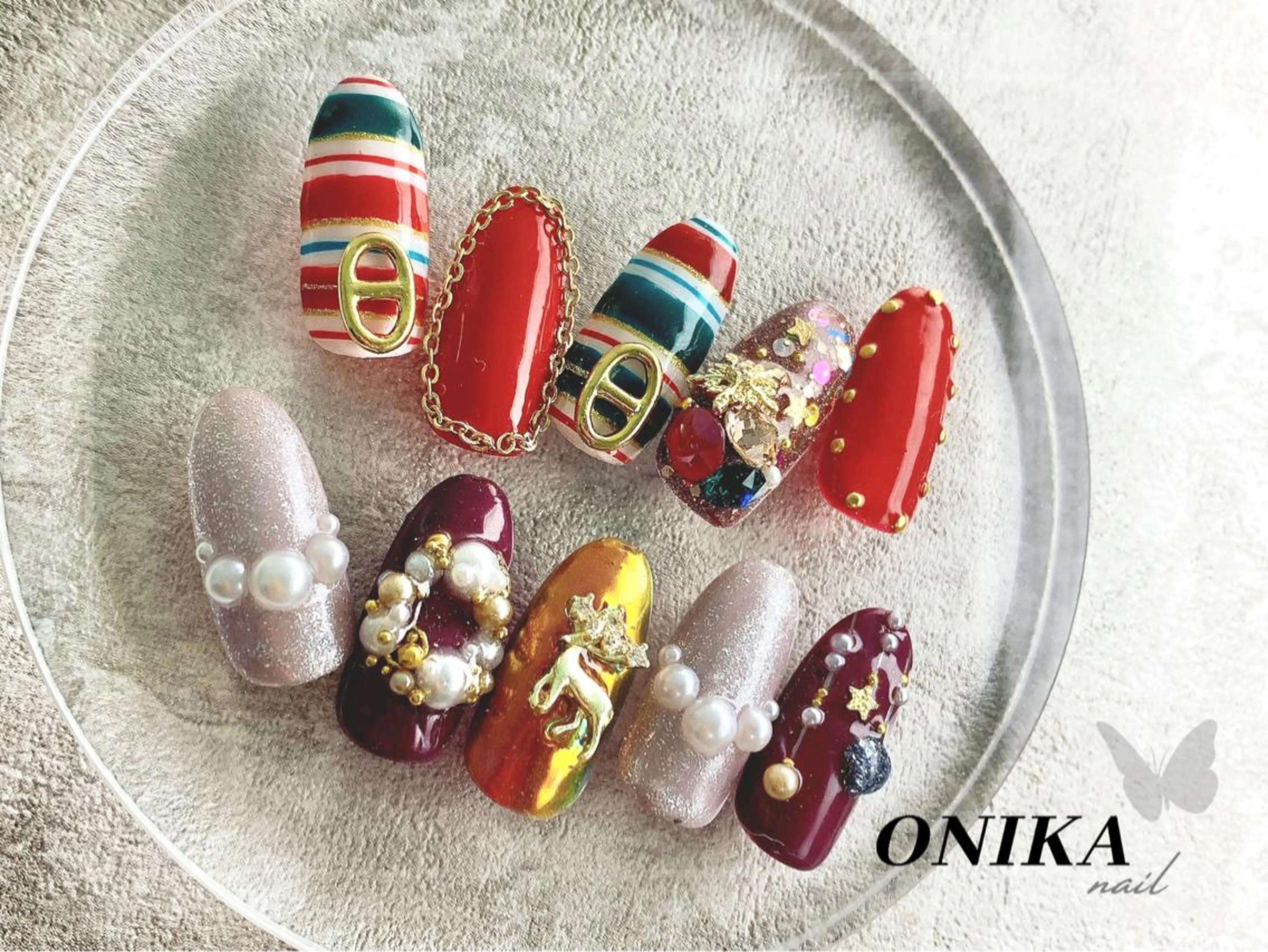 ネイル グリーン 赤色 ONIKA Nail 青山通り店所属・ONIKAnail 表参道のネイルデザイン