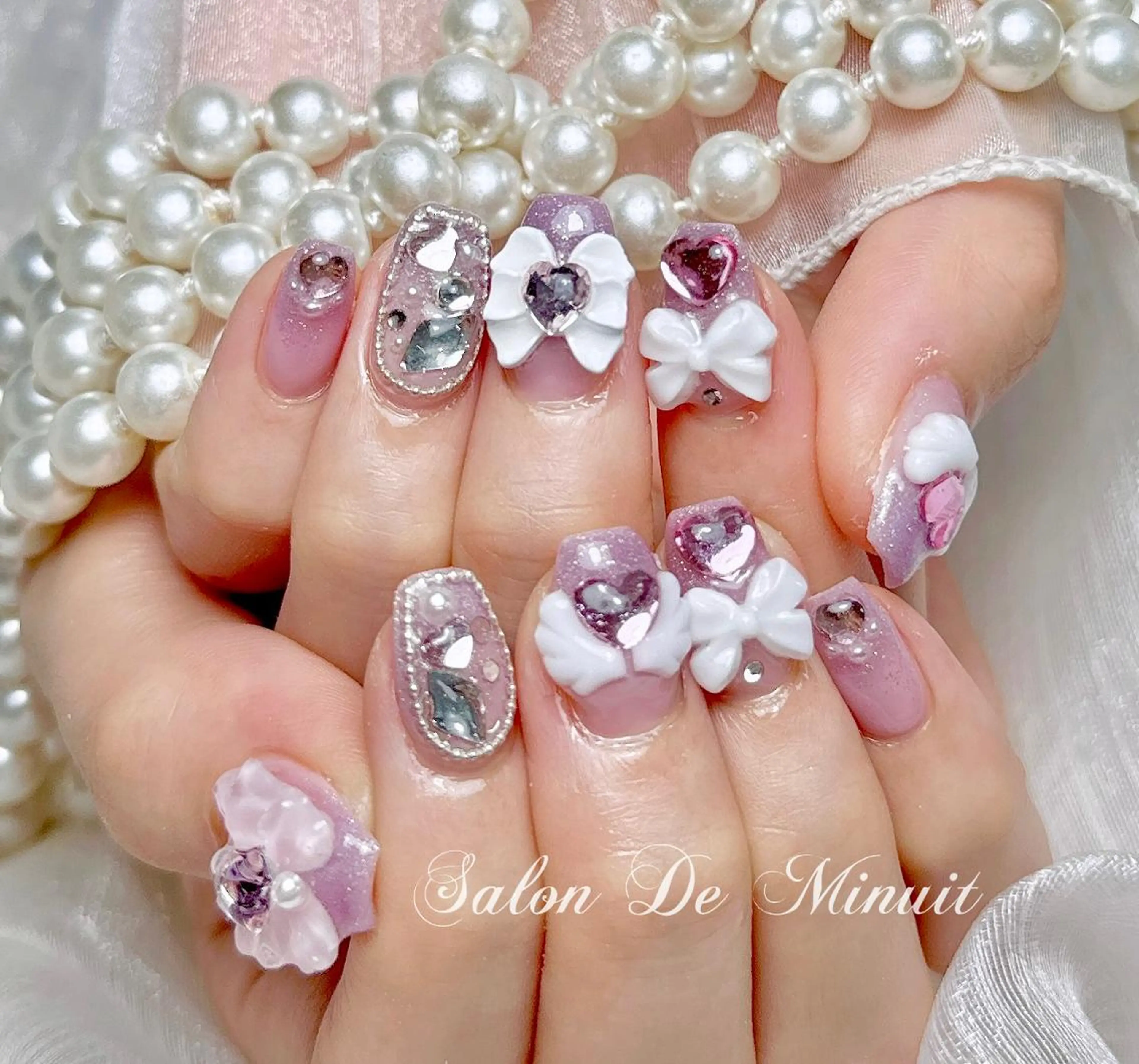 ネイル Salon de Minuit🦩のネイルデザイン