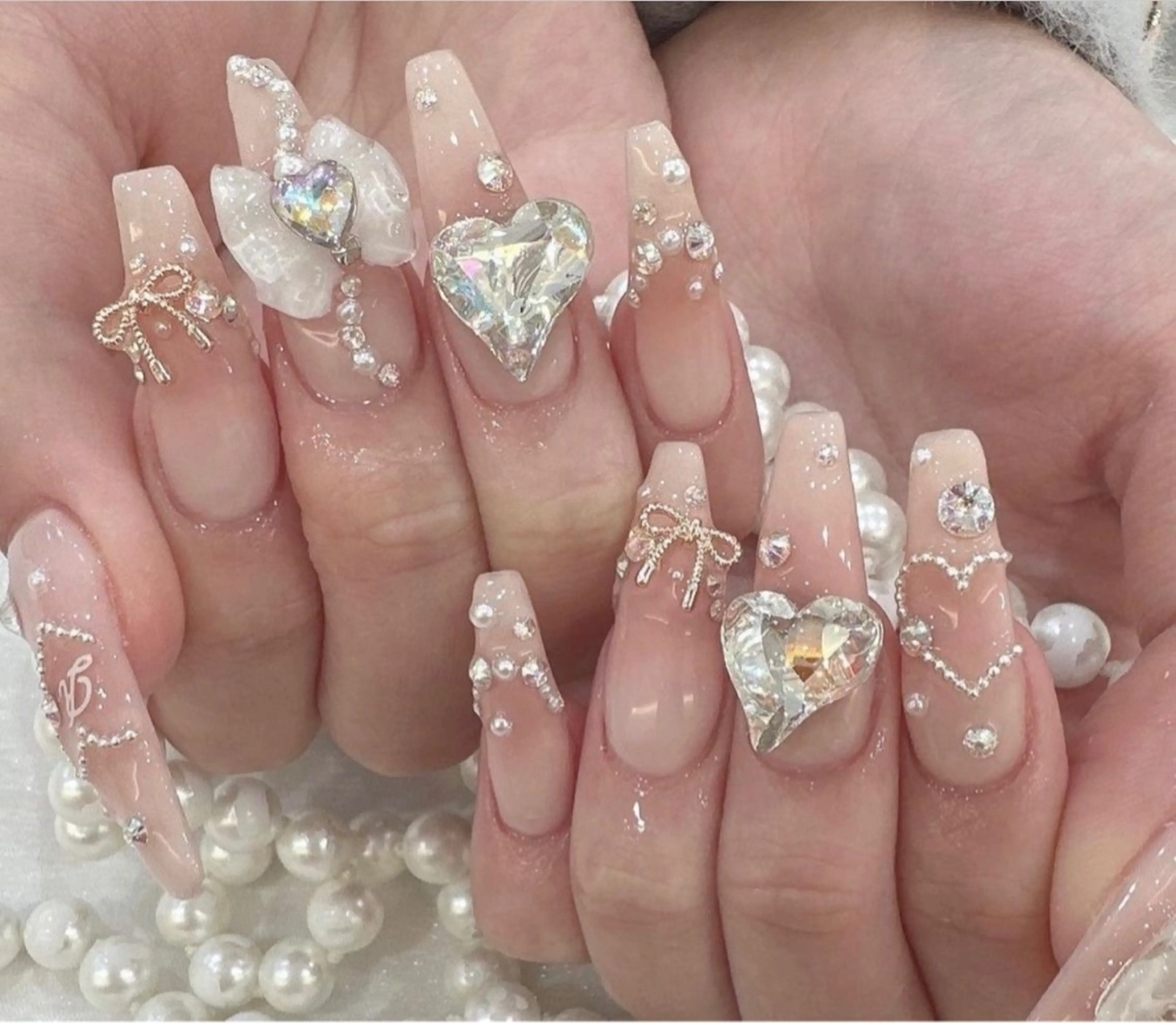 ネイル 成人式 ロングネイル マグネットネイル 大理石ネイル(マーブル) リボン ハンドネイル Amee Nailsalon所属・Amee Nailsalonのネイルデザイン