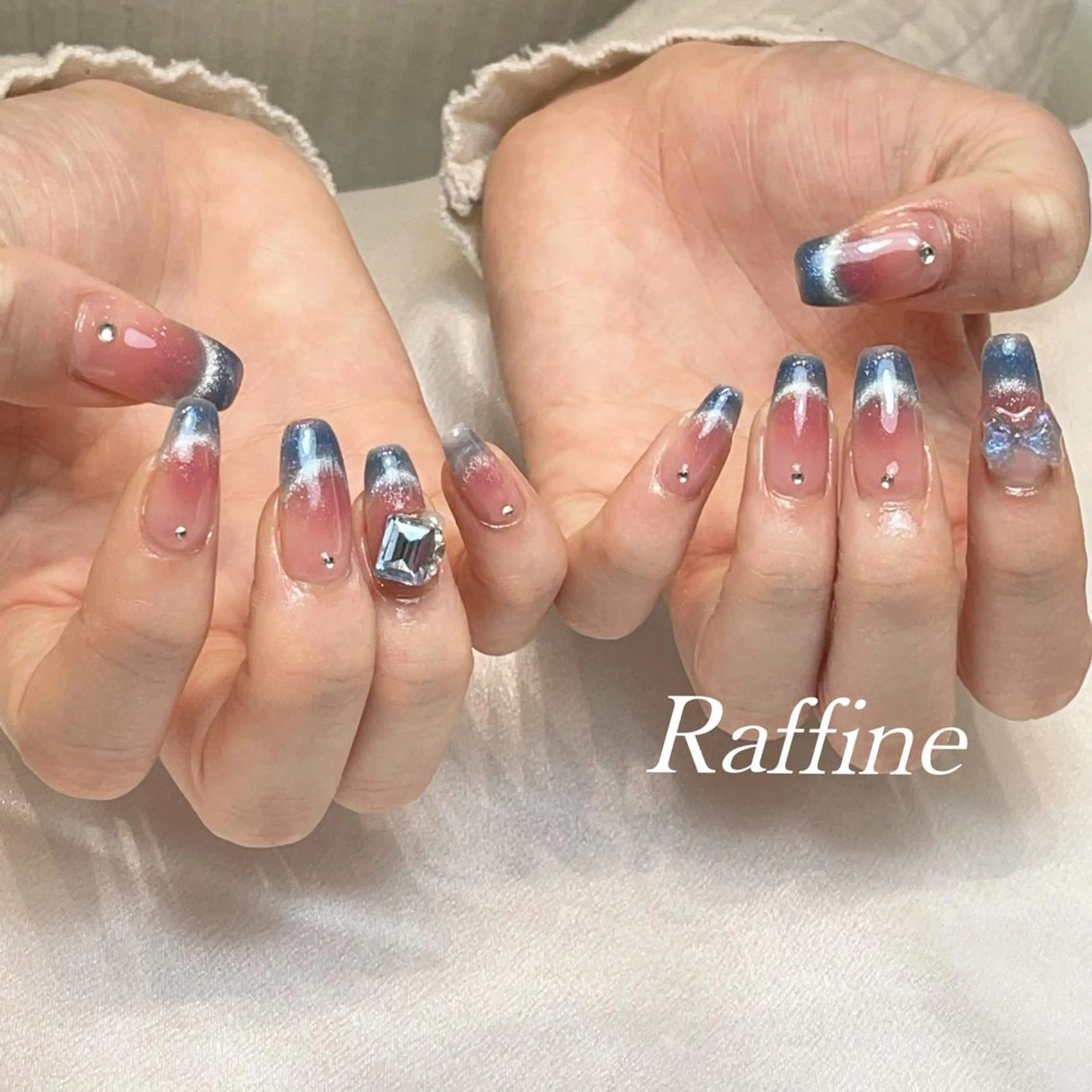 ネイル RAFFINE 月🦋🩵のネイルデザイン