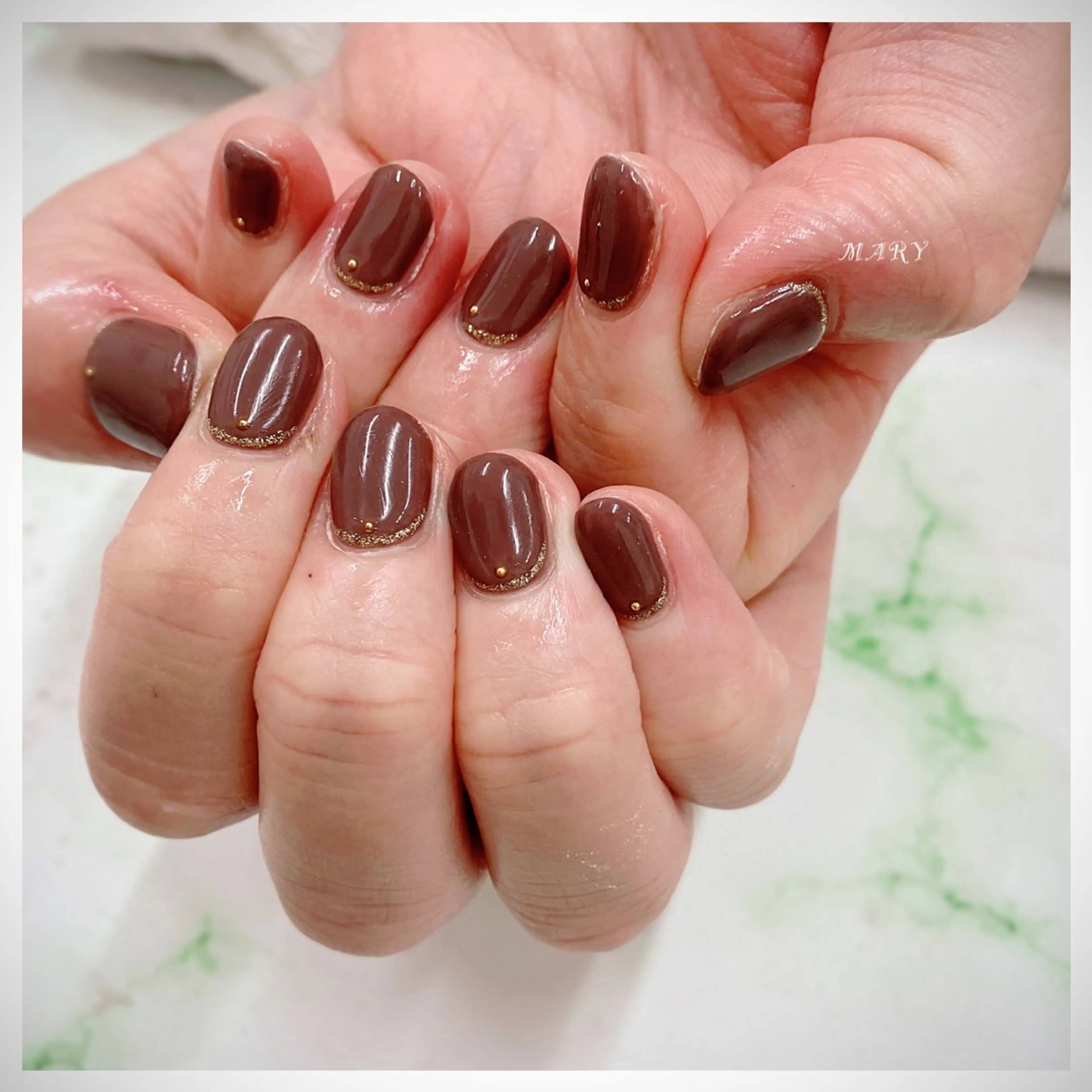 ネイル ブラウン ラメ(グリッター) ニュアンスネイル ワンカラーネイル シンプルネイル ハンドネイル Mary nail所属・Mary nail .narumiのネイルデザイン