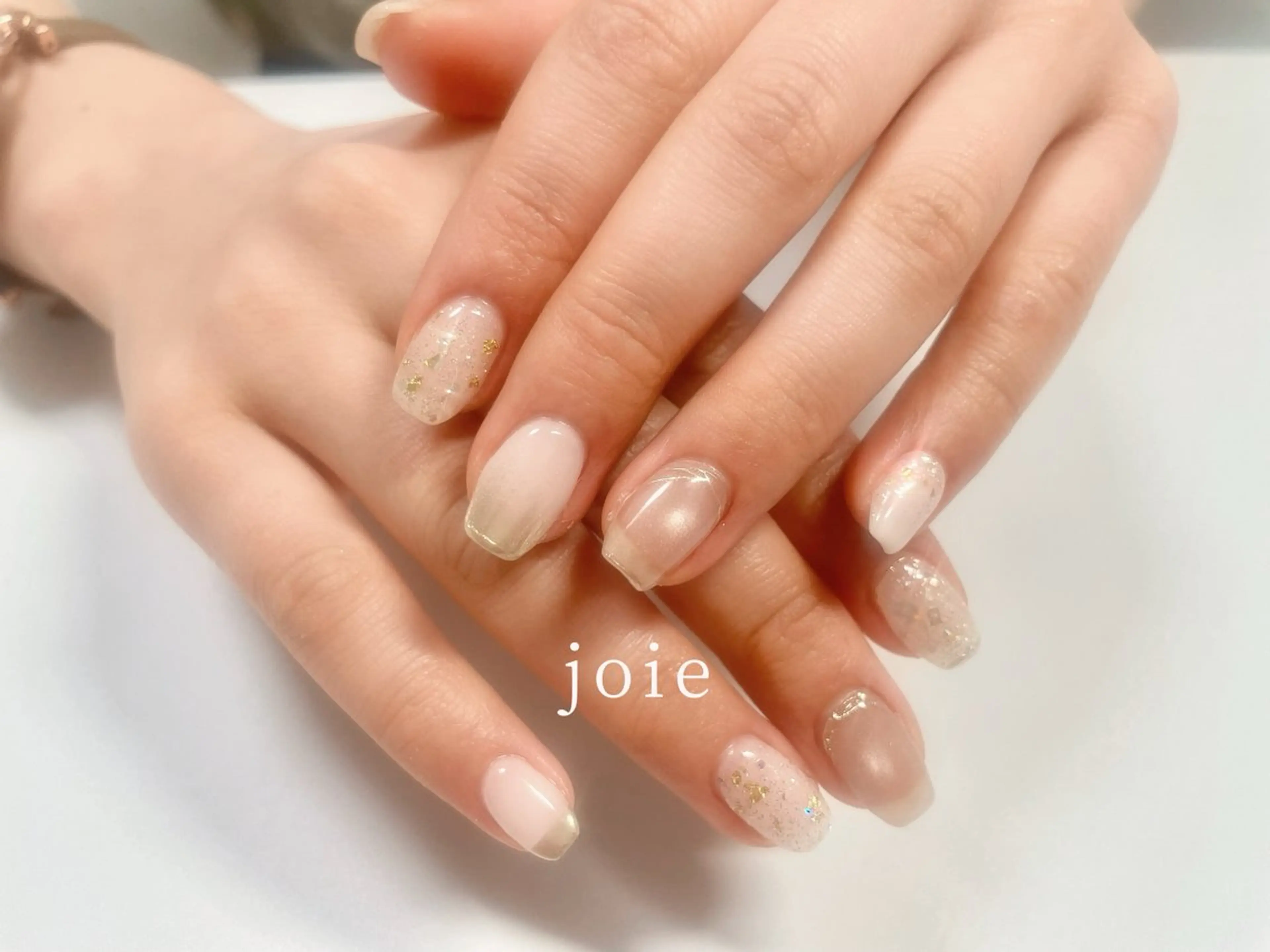 ネイル キラキラネイル ニュアンスネイル オフィスネイル リボン Jr.nailist Mikuのネイルデザイン