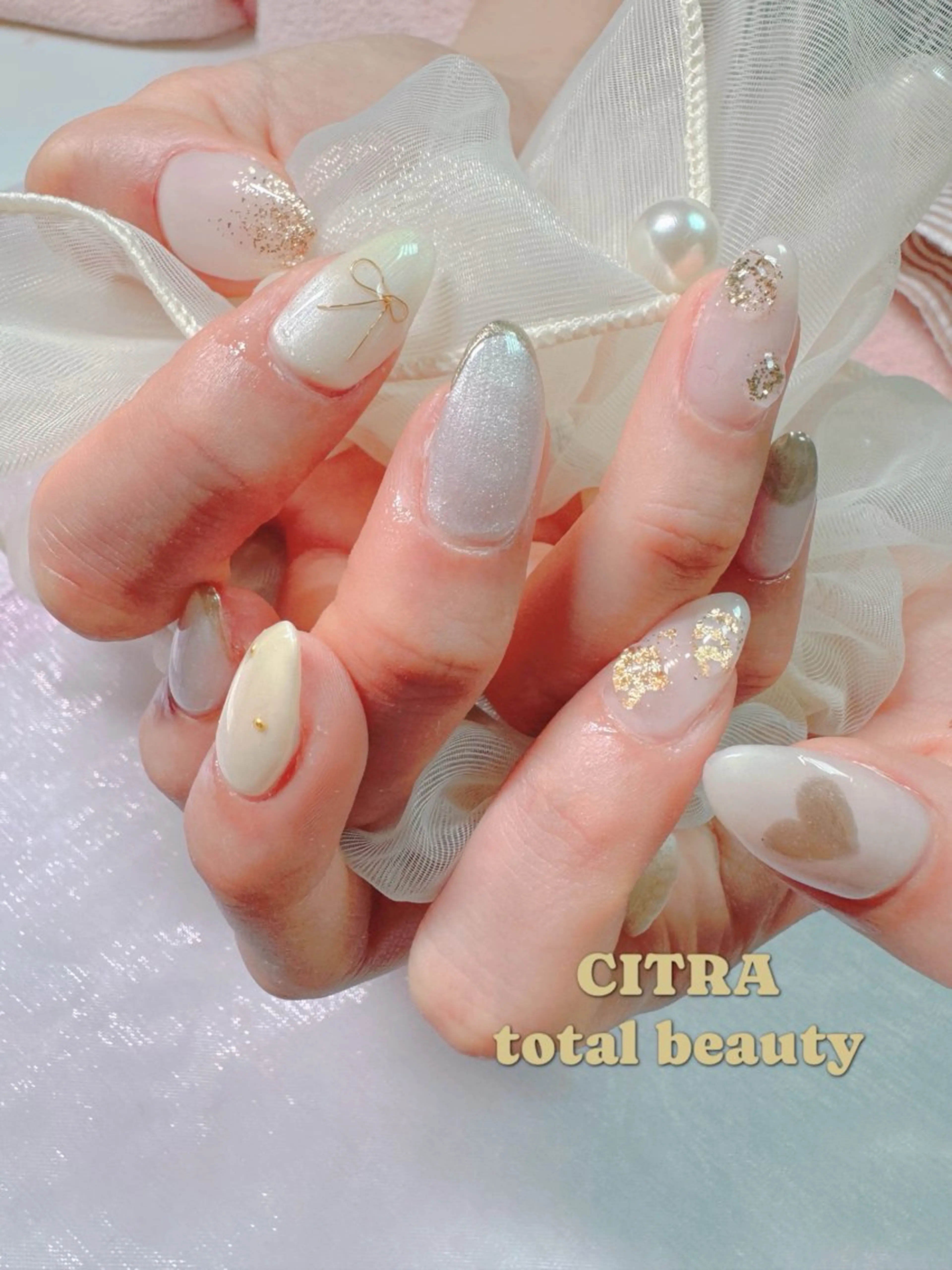 ネイル ニュアンスネイル リボン ハンドネイル CITRAtotal beautyのネイルデザイン