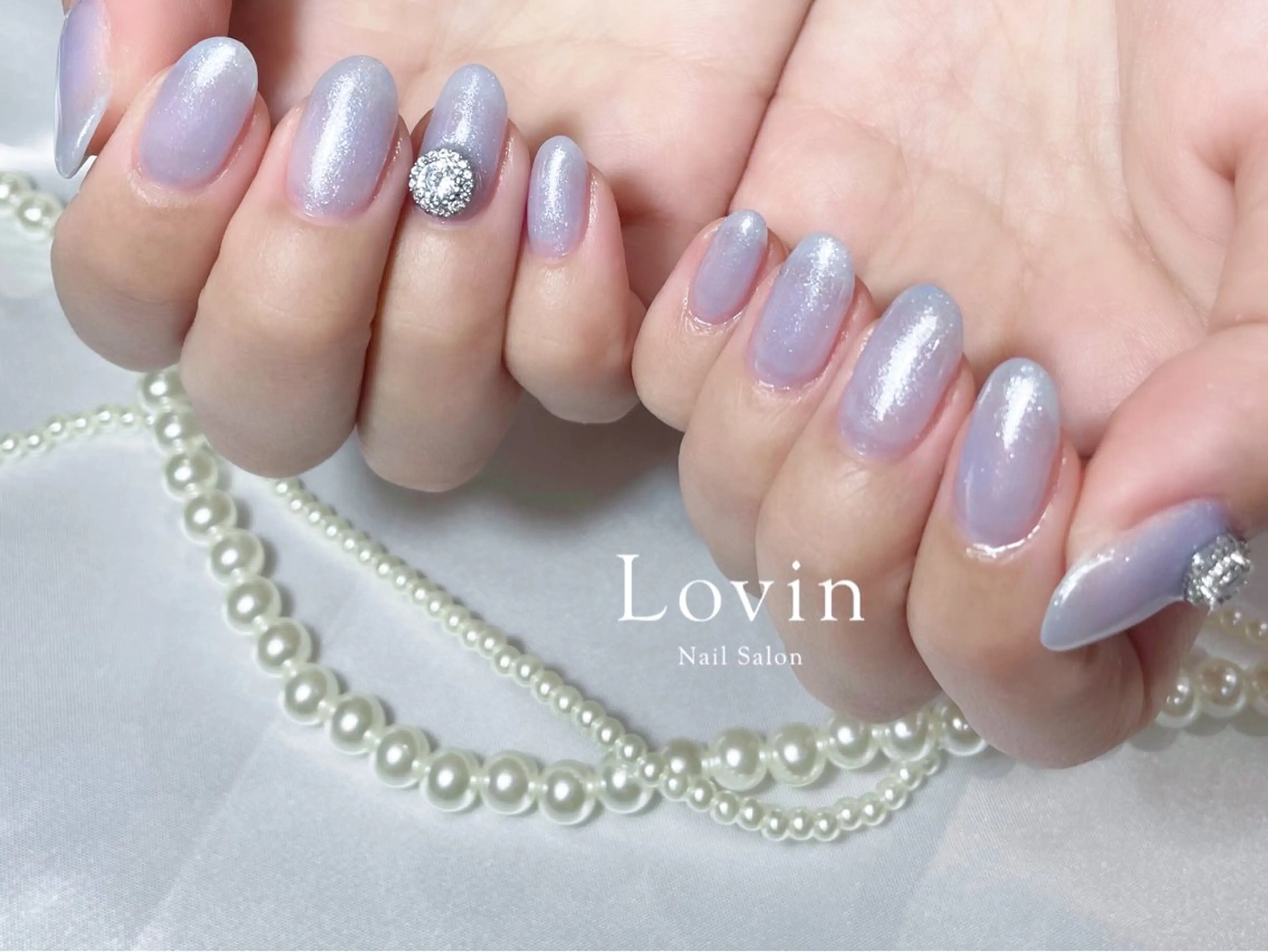 ネイル ジェルネイル キラキラネイル ラメ(グリッター) 水色 オフィスネイル パラジェルプレミアムサロン nail care &spa Lovin［ラヴィン］所属・Azegami Minaのネイルデザイン