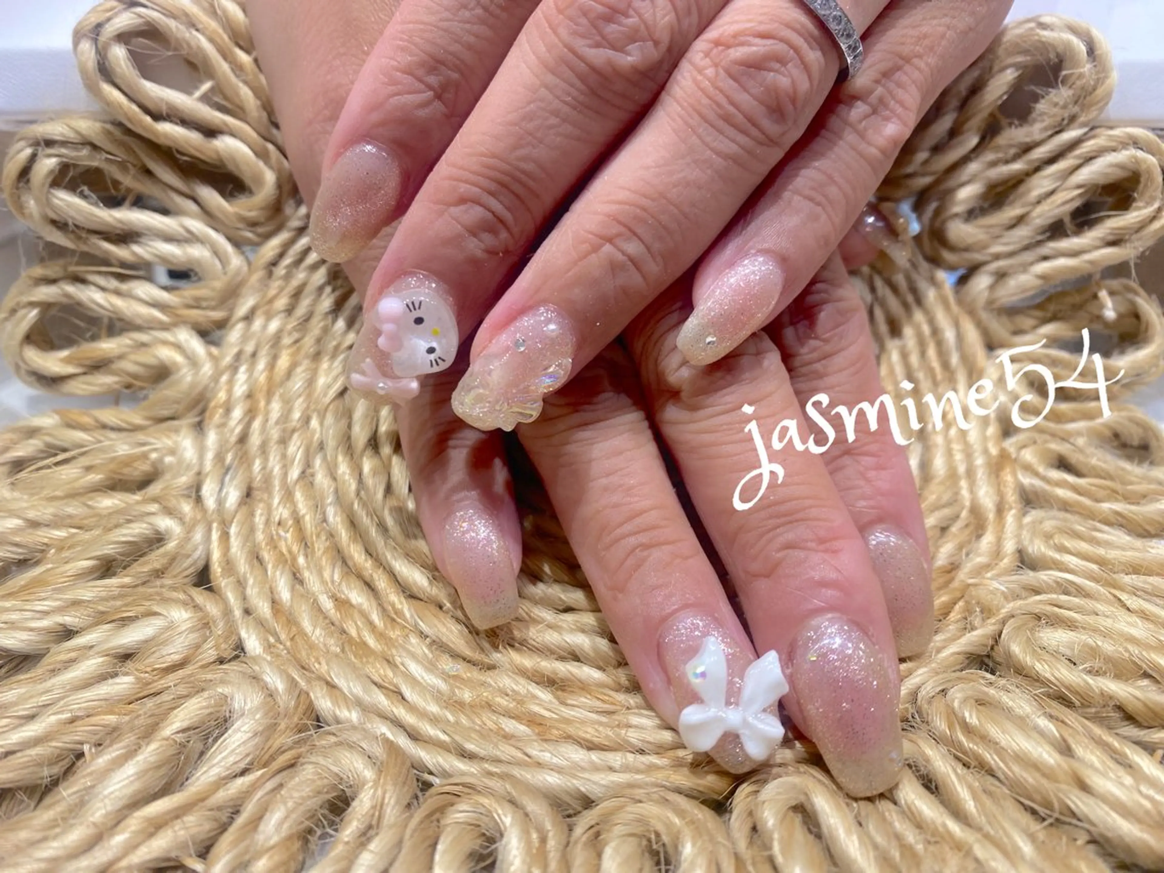 ネイル ラメ(グリッター) リボン jasmine54所属・jasmine54 mihoのネイルデザイン