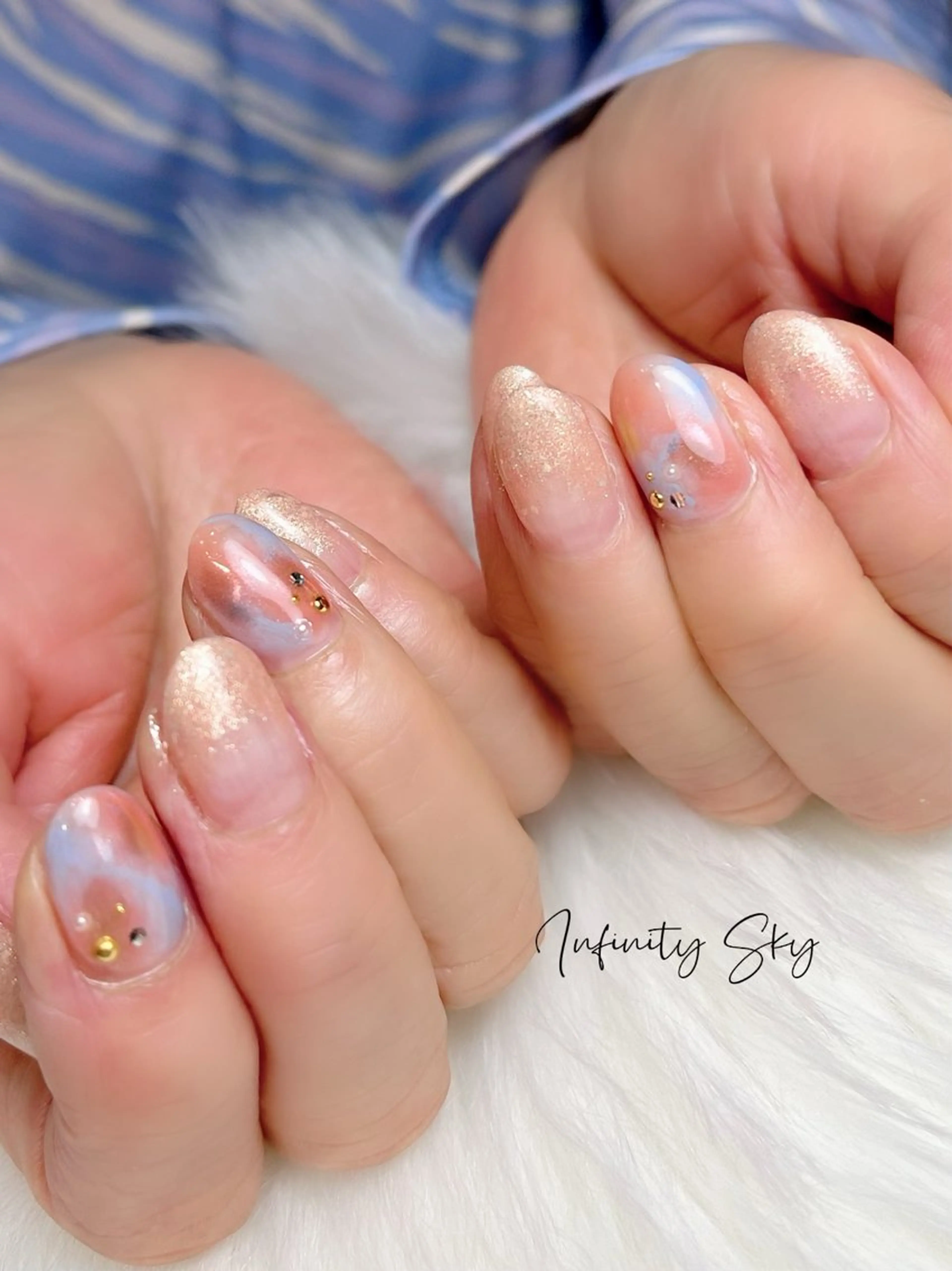 ネイル ブルー オレンジ infinity skyのネイルデザイン