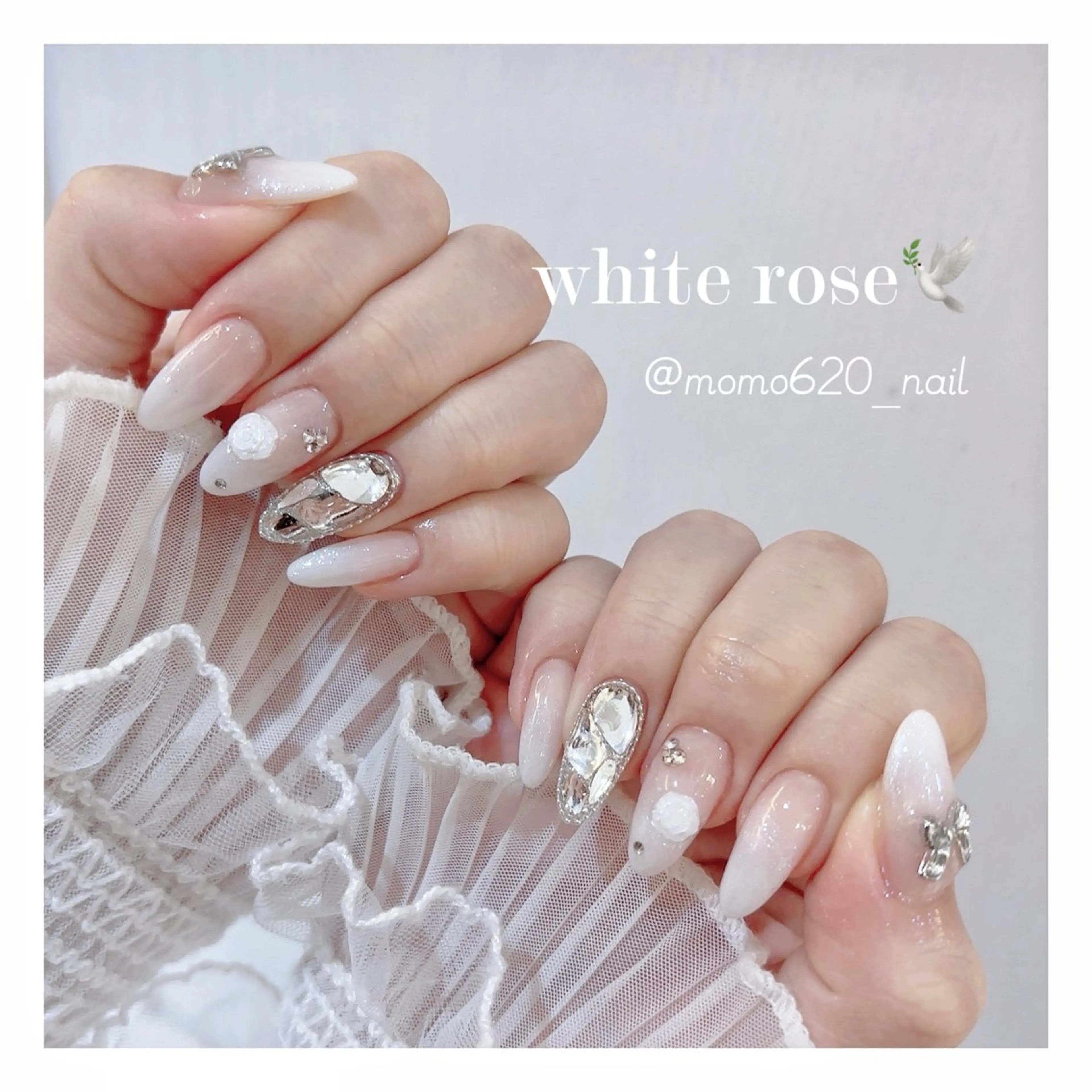 ネイル ホワイト ハンドネイル フットネイル nailsalon moca 堀江店所属・moca堀江店 momokaのネイルデザイン