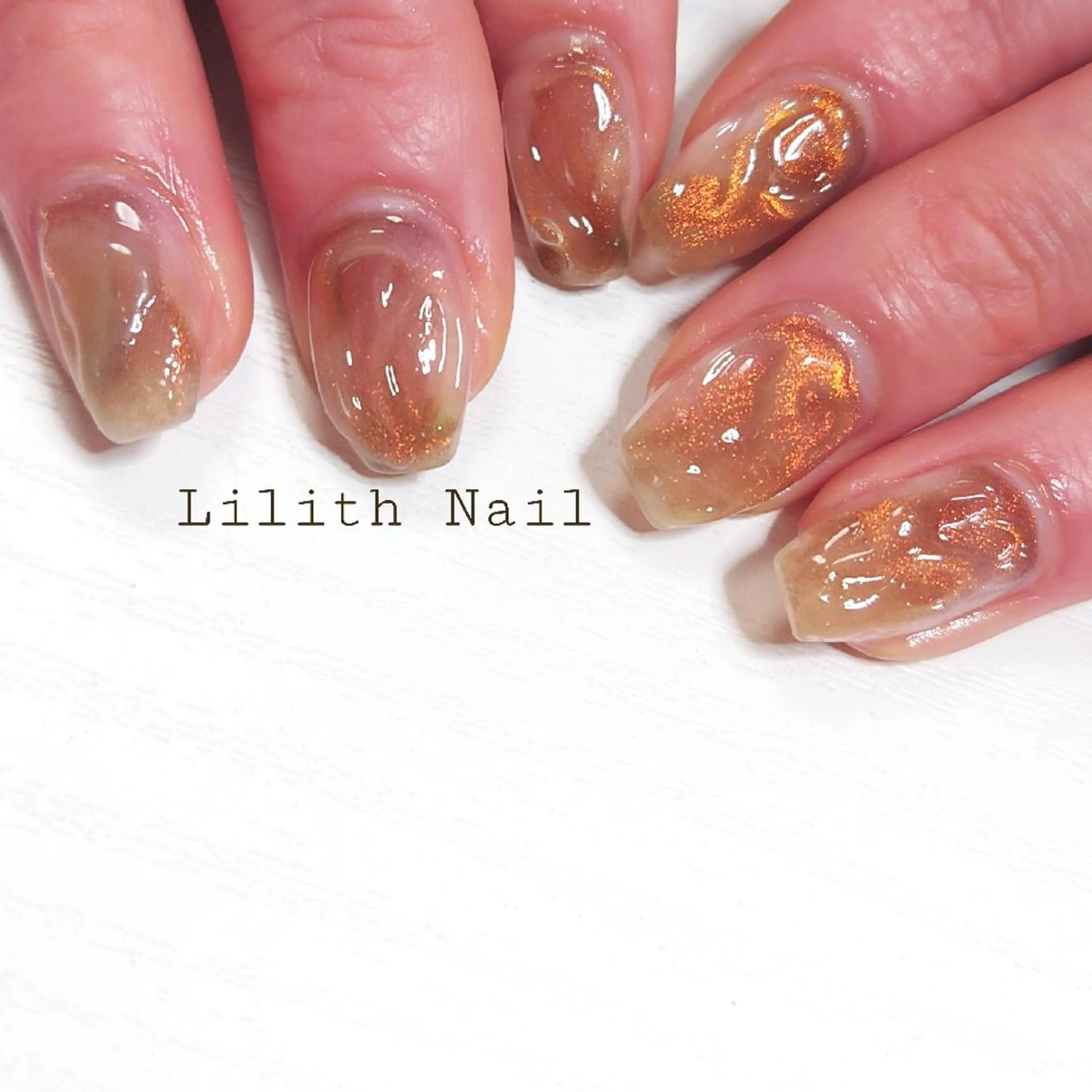 ネイル ブラウン クリアネイル マグネットネイル オレンジ 春ネイル ハンドネイル Lilith Nailのネイルデザイン