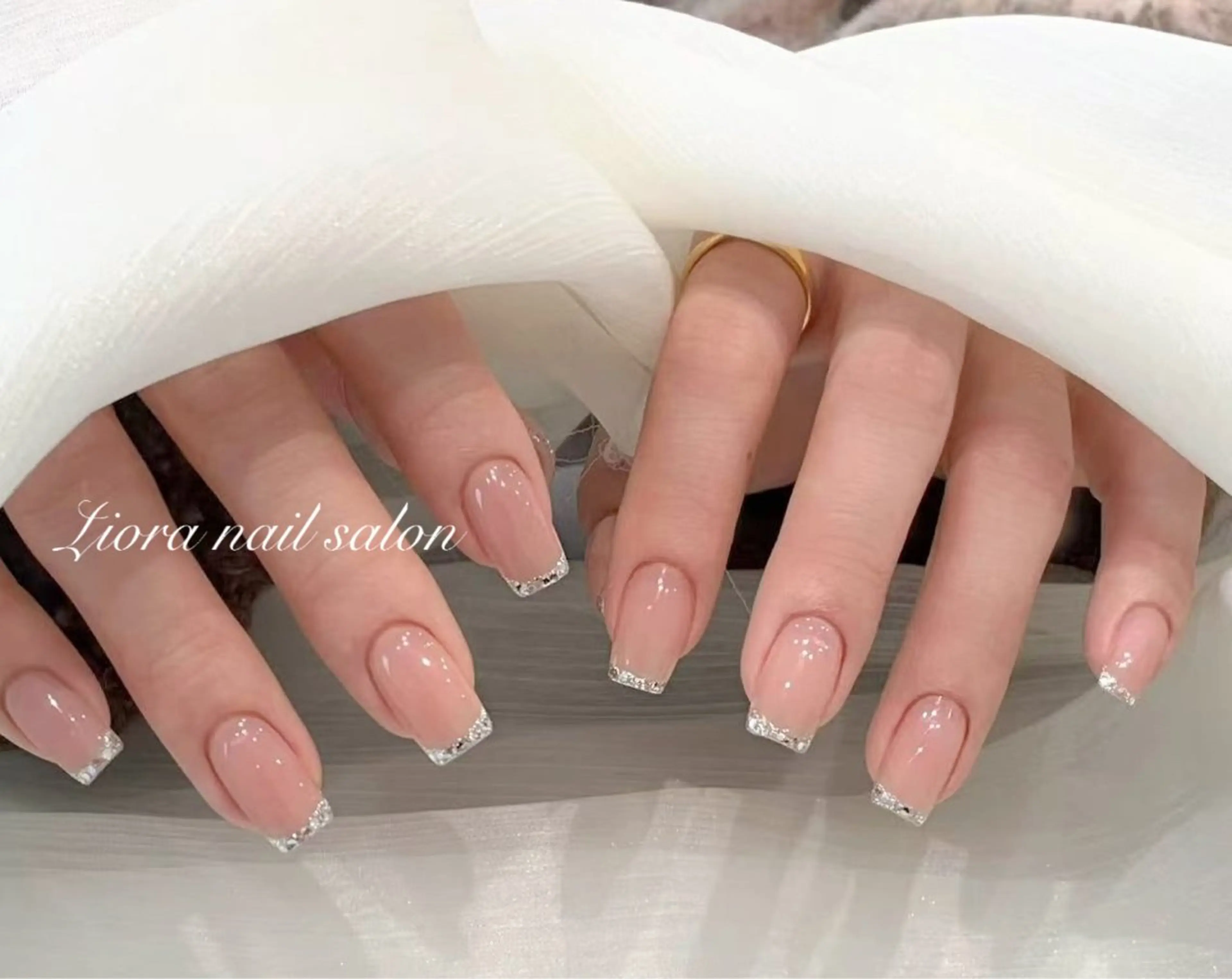 ネイル フレンチネイル ジェルネイル ガーリー グラデーション キラキラネイル ハンドネイル Liora ネイルサロン所属・Liora nail salonのネイルデザイン