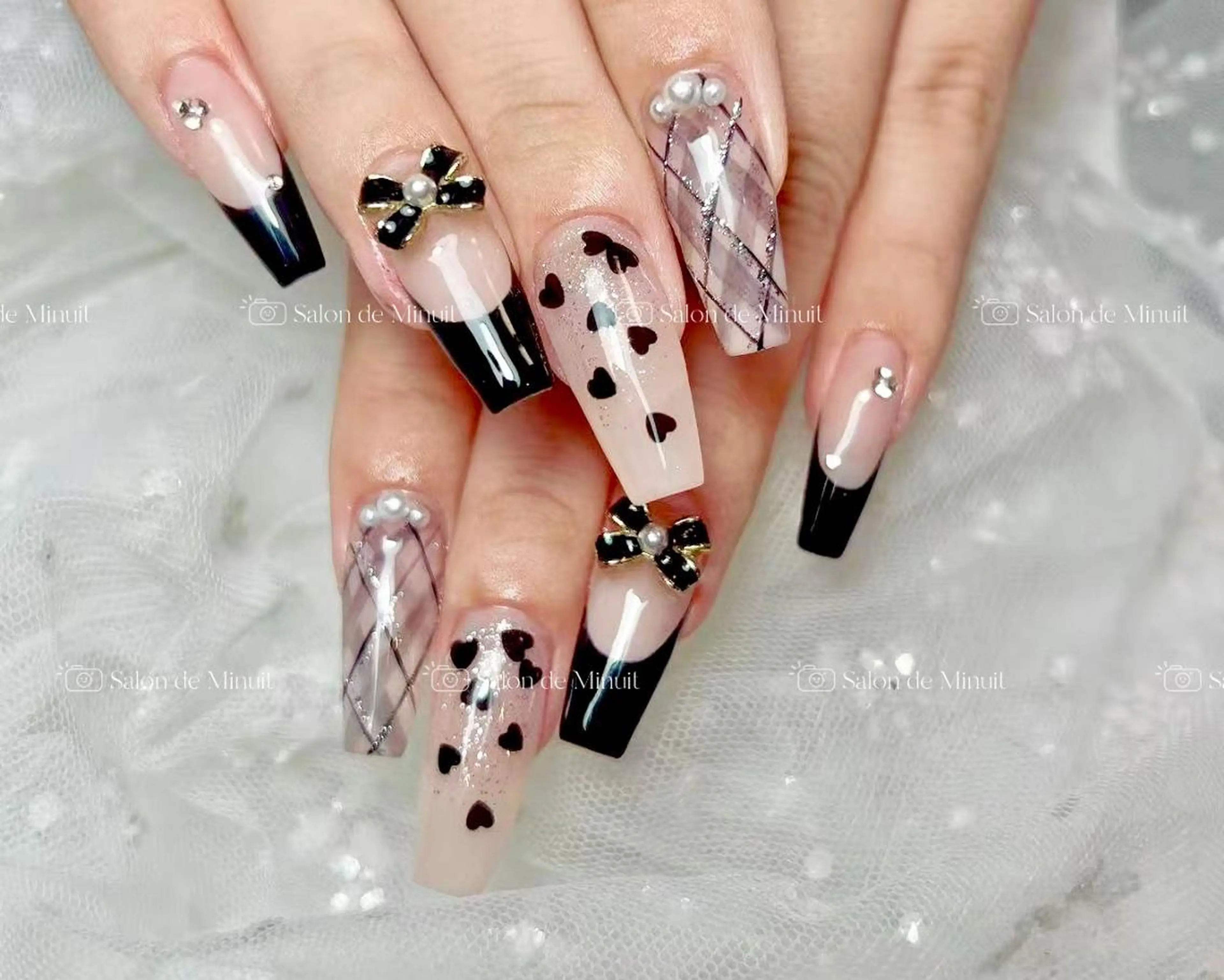 ネイル Salon de Minuit🦩のネイルデザイン