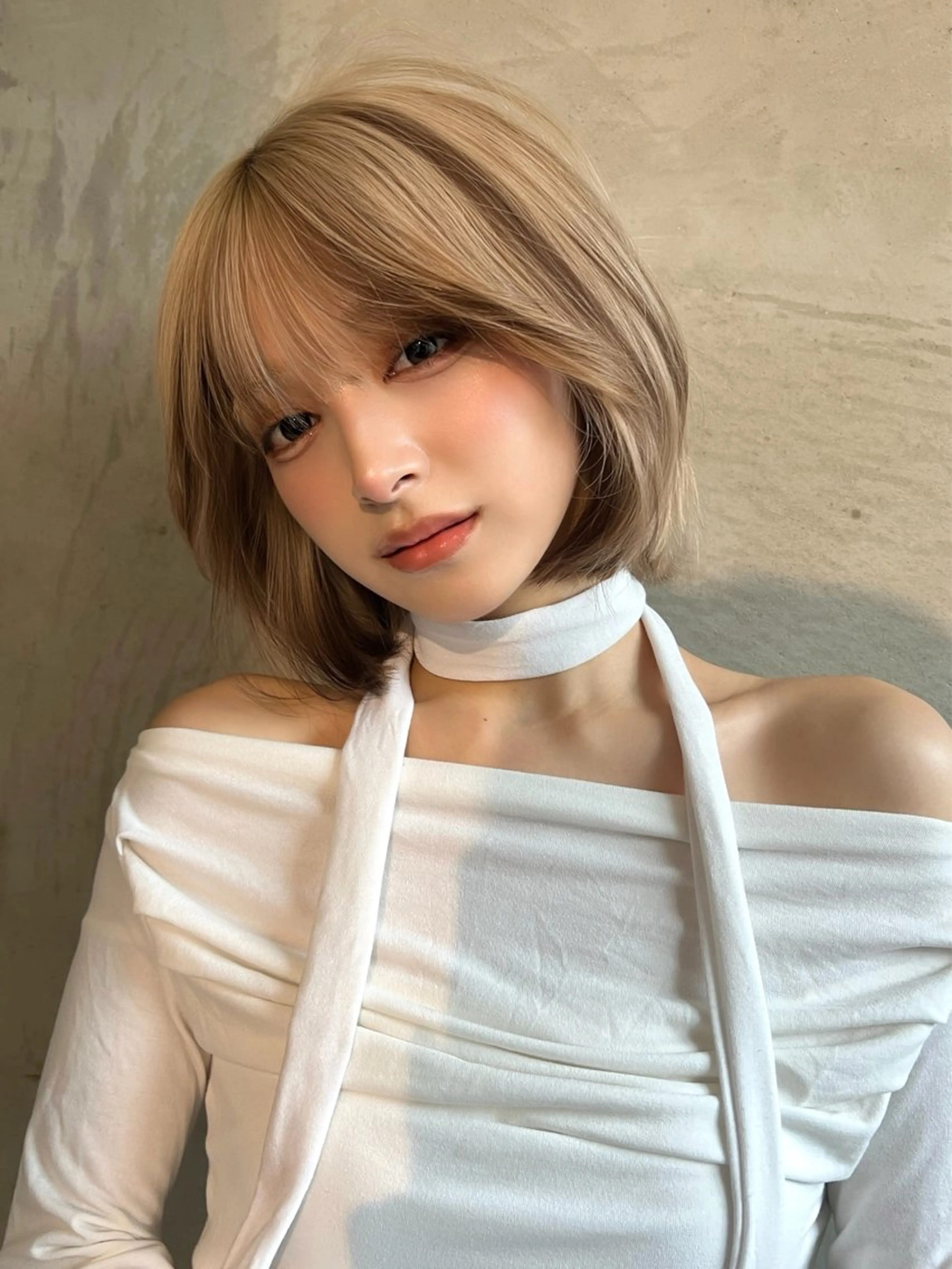 ミディアム カラー 切りっぱなしボブ ブリーチ ケアブリーチ デザインカラー ボブ カット ヘアカラー トリートメント belle   表参道 terrace所属・抜きっぱなしブロンド /ハイトーン/カナタのヘアスタイル