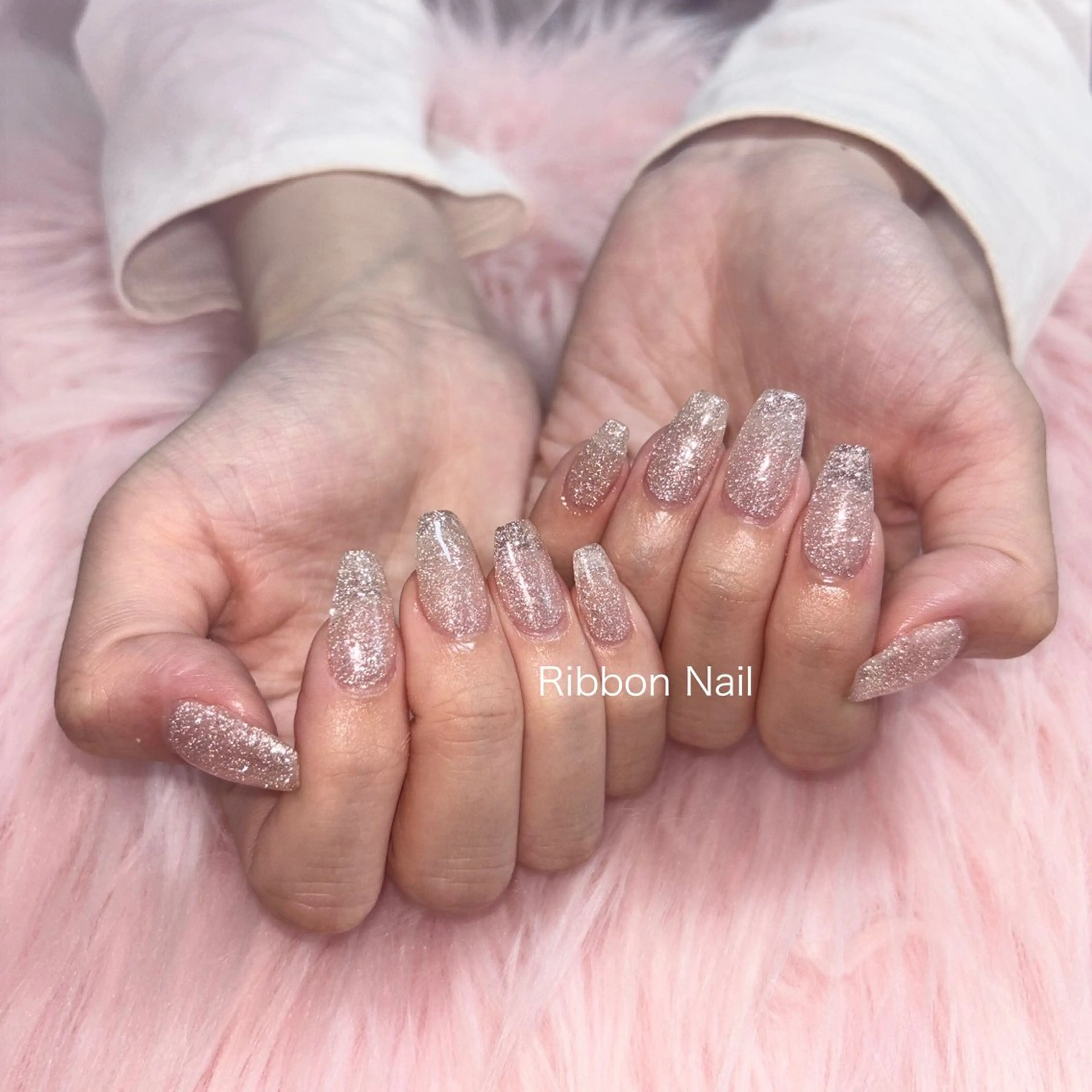 ネイル フラッシュネイル キラキラネイル ピンク ハンドネイル Ribbon nailのネイルデザイン