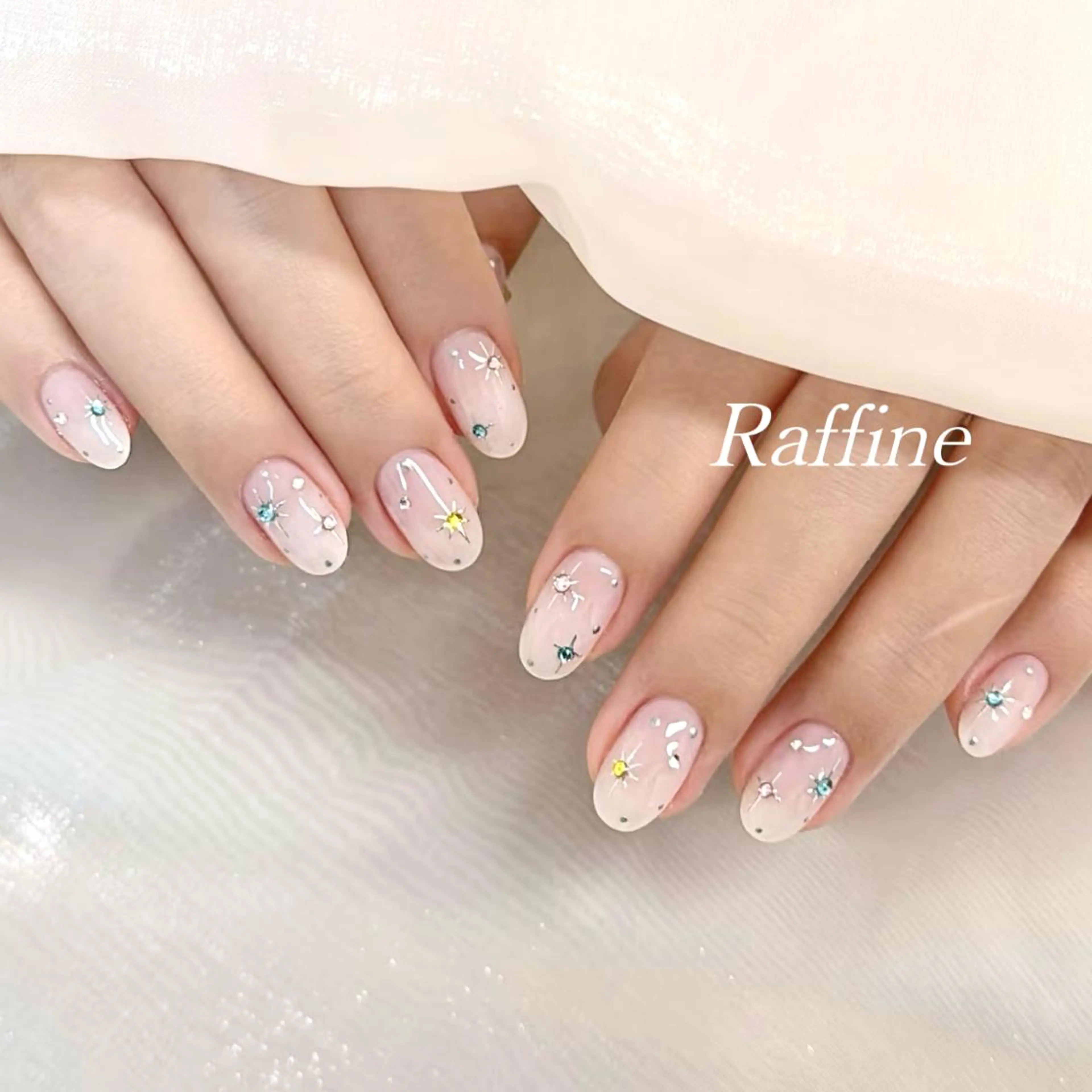 ネイル RAFFINE 月🦋🩵のネイルデザイン