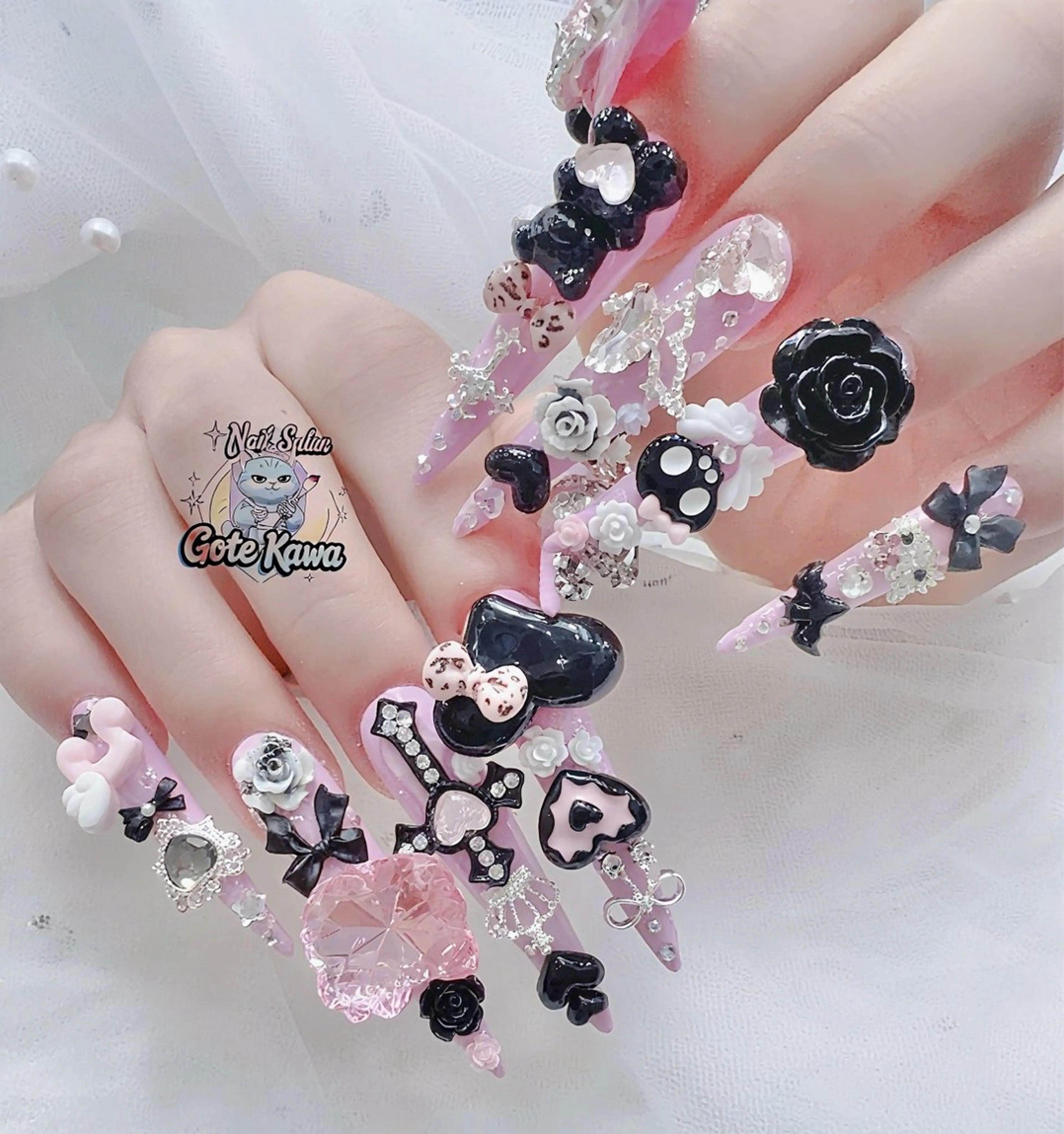 ネイル アートネイル 長さ出し キラキラネイル ピンク リボン ハンドネイル ハンドケア GOTE KAWA Nail Salon(ゴテかわ)所属・Gote Kawa nail salonのネイルデザイン