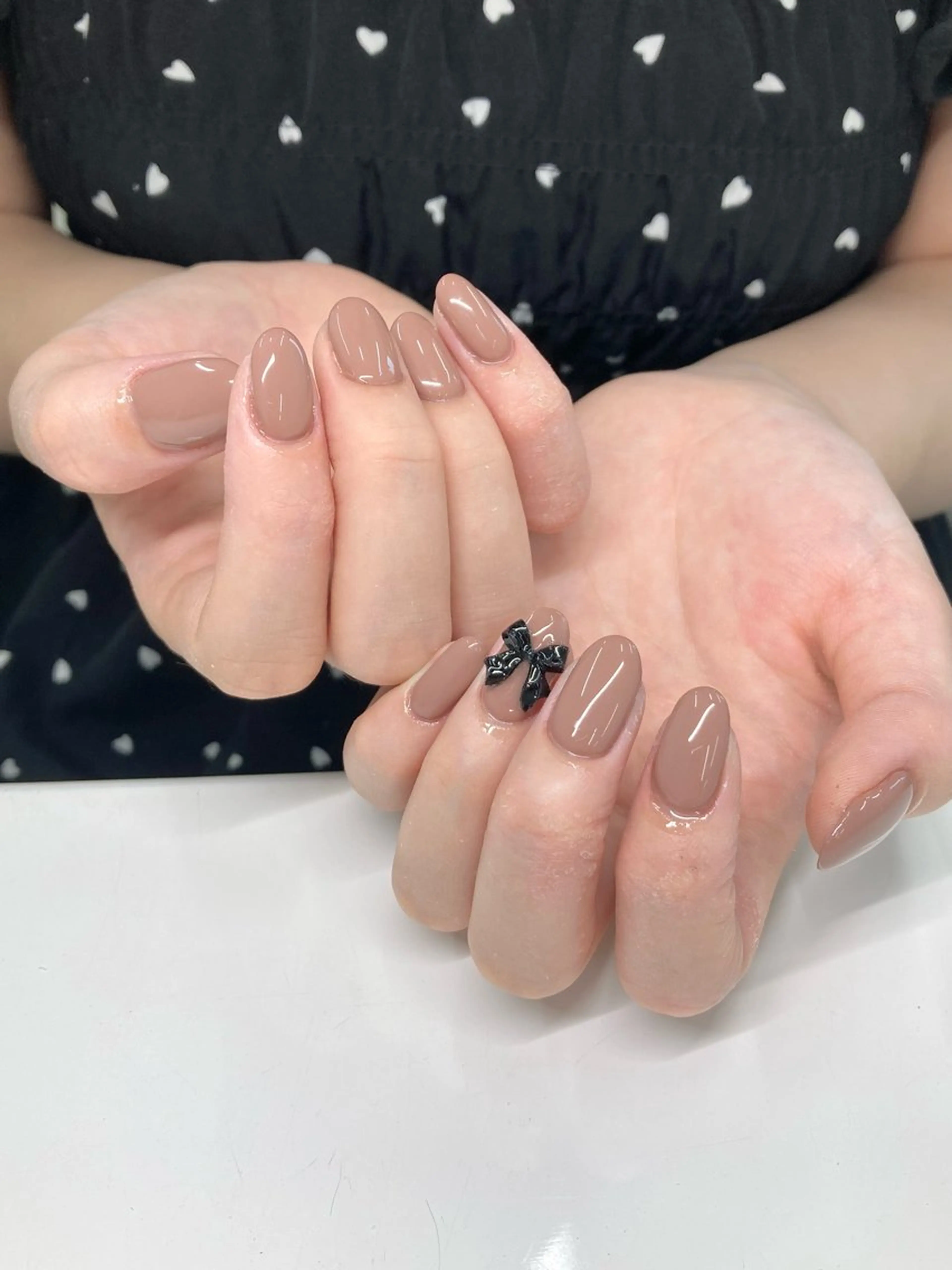 ネイル ワンカラーネイル リボン シンプルネイル Nail Total beauty salon Laki所属・佐々木 優花のネイルデザイン