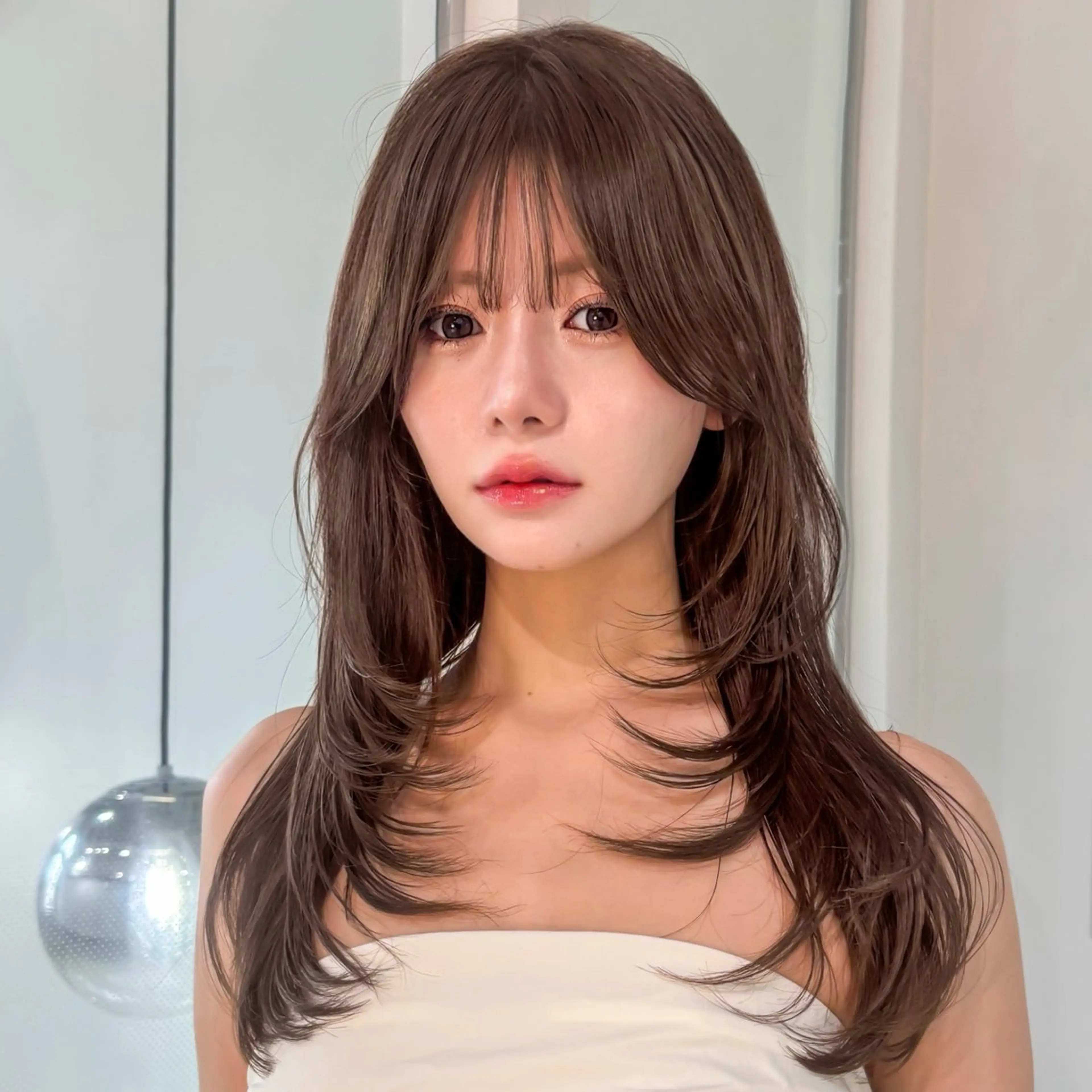 ロング くびれヘア 韓国風ヘア レイヤーカット 小顔カット ヘアカラー トリートメント 🤍aimi🤍 ウルフ/韓国ヘアのヘアスタイル