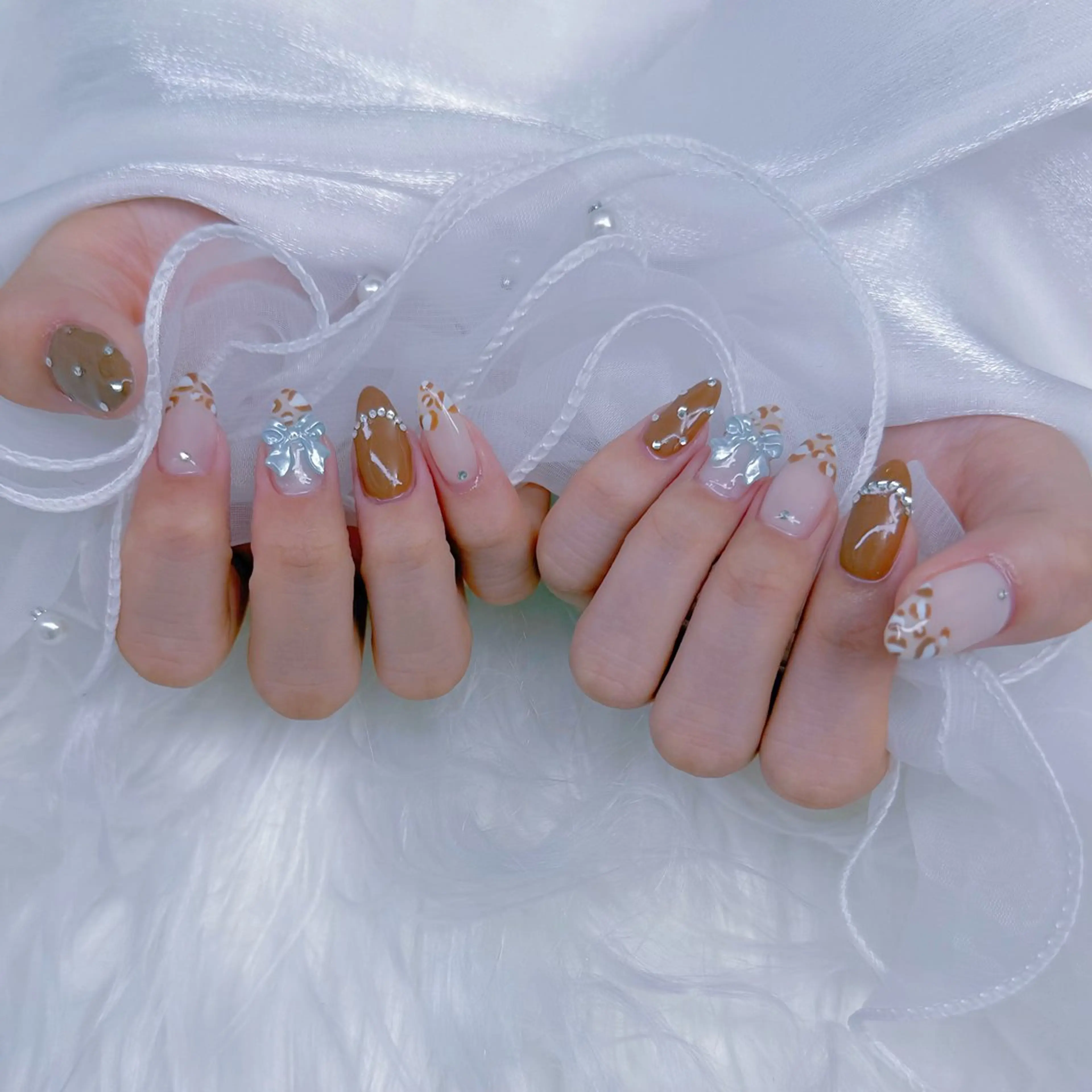 ネイル アニマル柄 リボン ハンドネイル Romymoon nail帆南☾ ໋のネイルデザイン