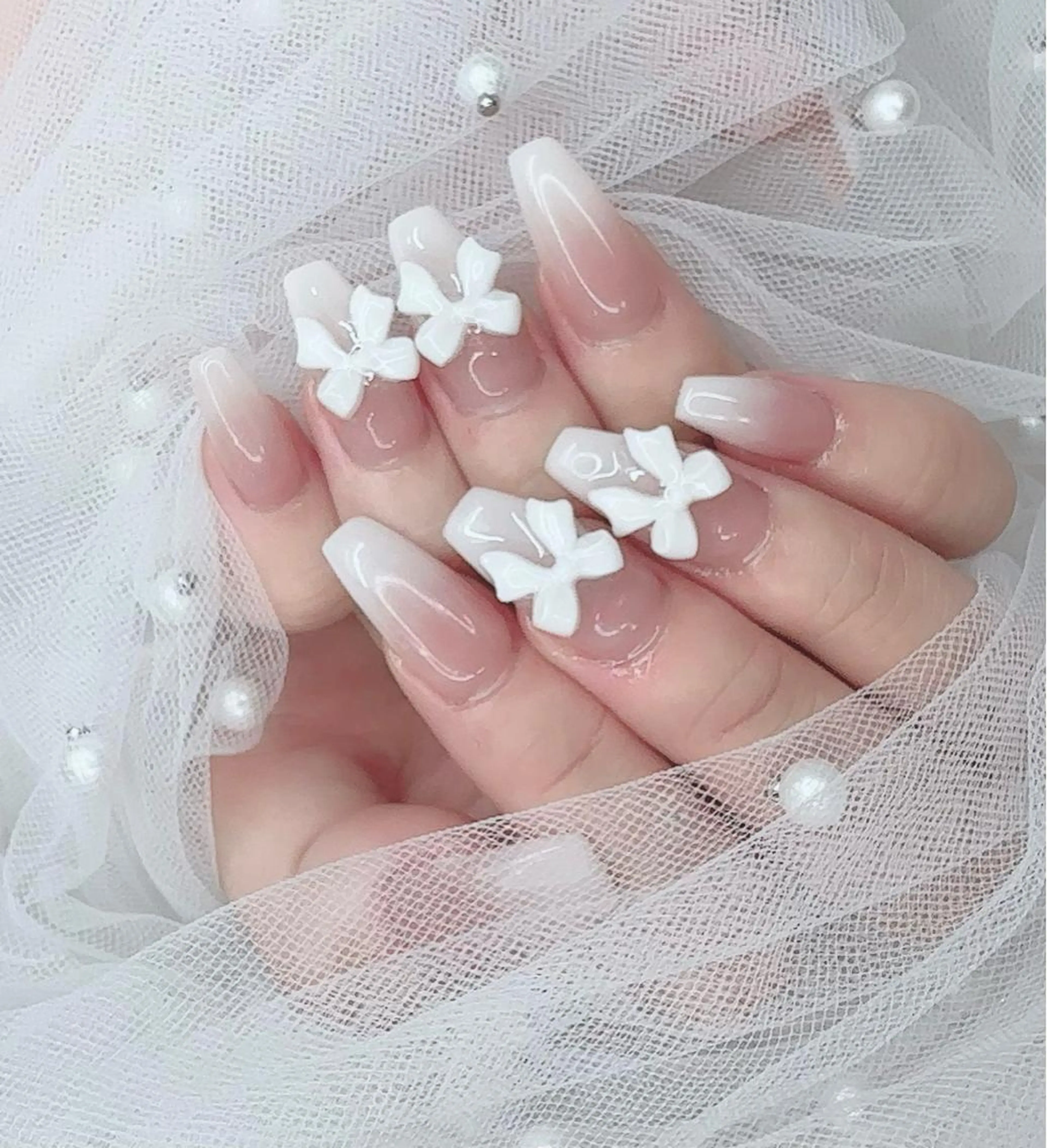 ネイル リボン R nailsalon所属・R salonのネイルデザイン