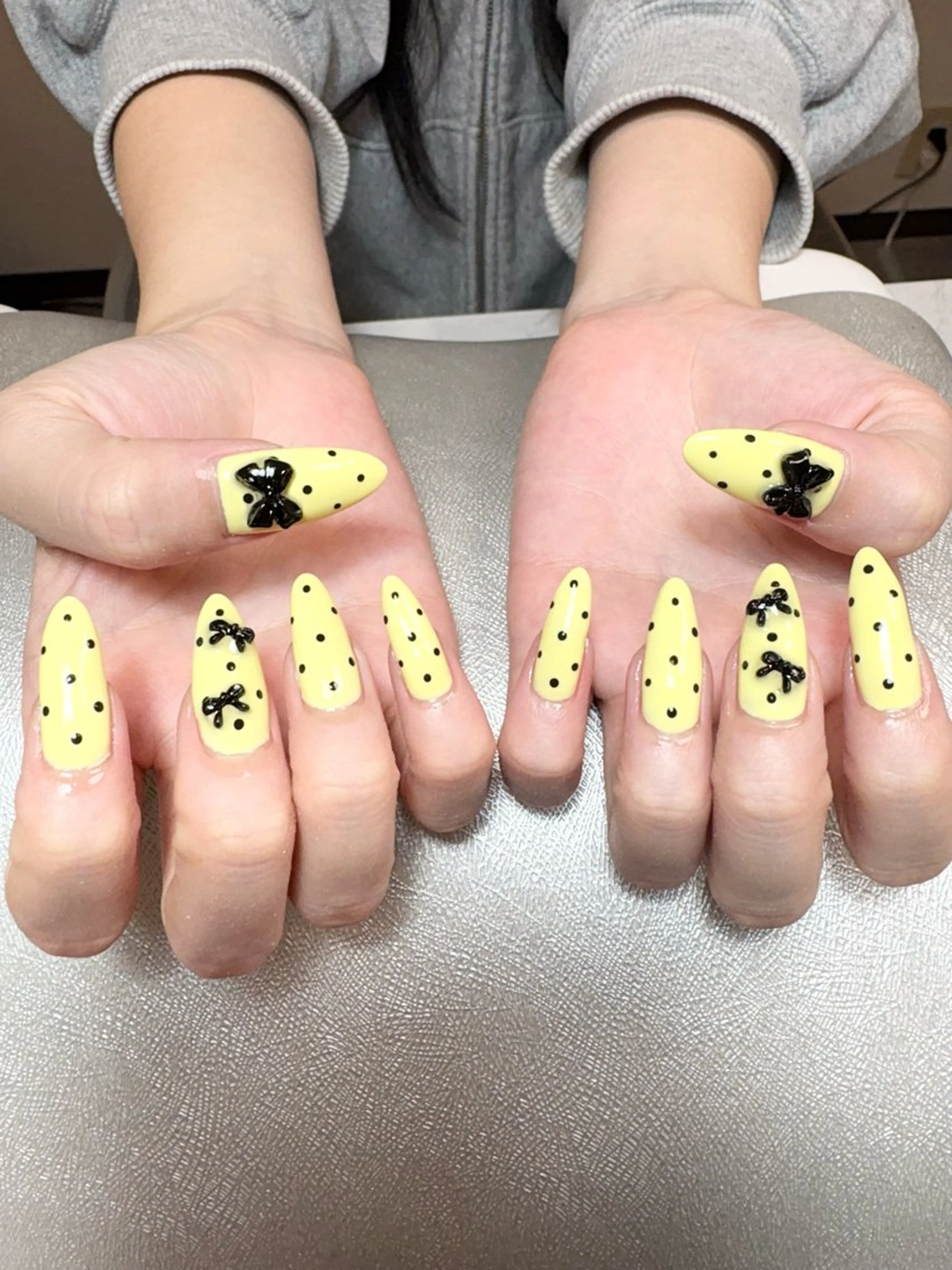 ネイル ドット パステルネイル リボン 黄色 ハンドネイル nailsalon Lumieのネイルデザイン