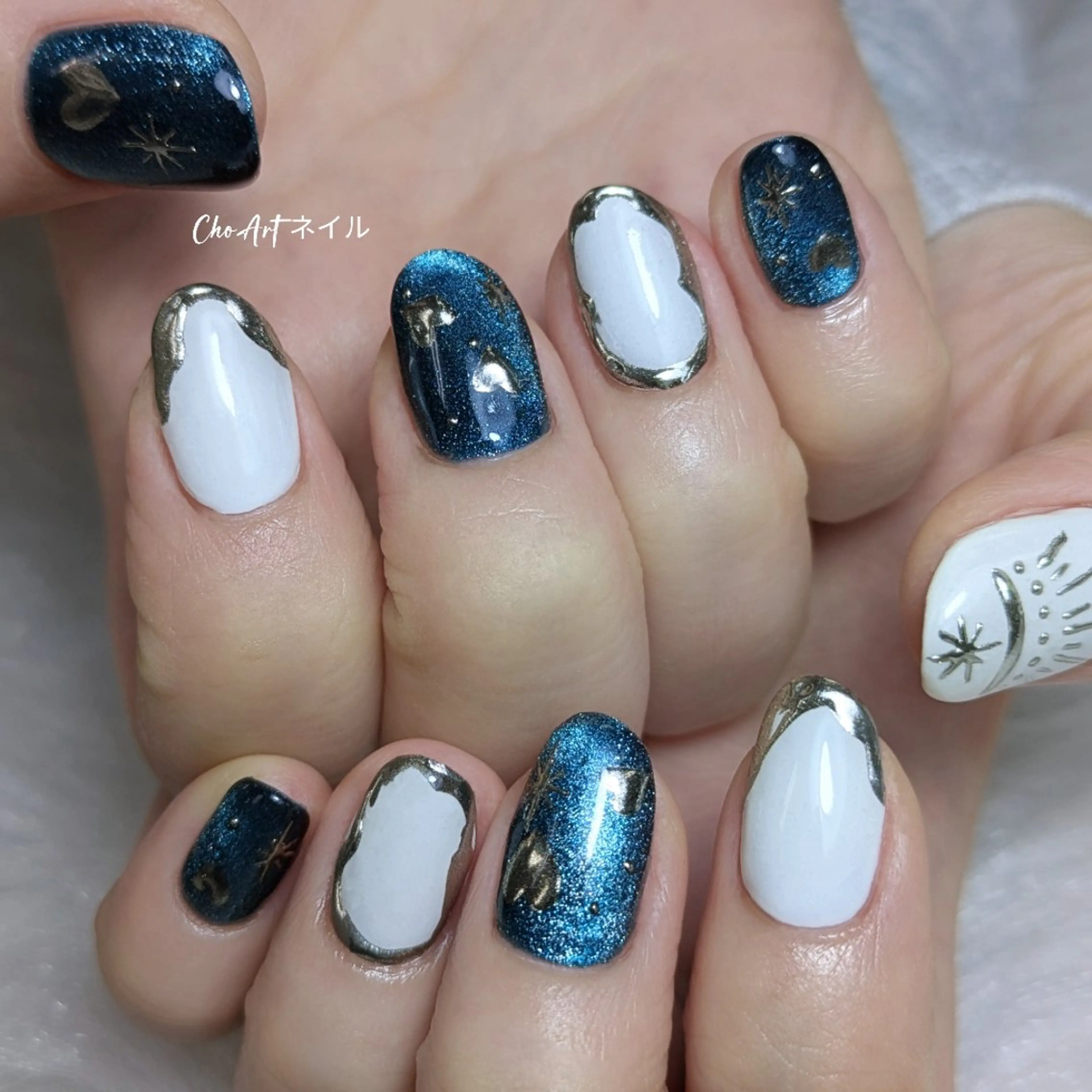 ネイル アートネイル ブルー キラキラネイル ラメ(グリッター) マグネットネイル Cho Artネイル所属・Cho Art ネイルのネイルデザイン