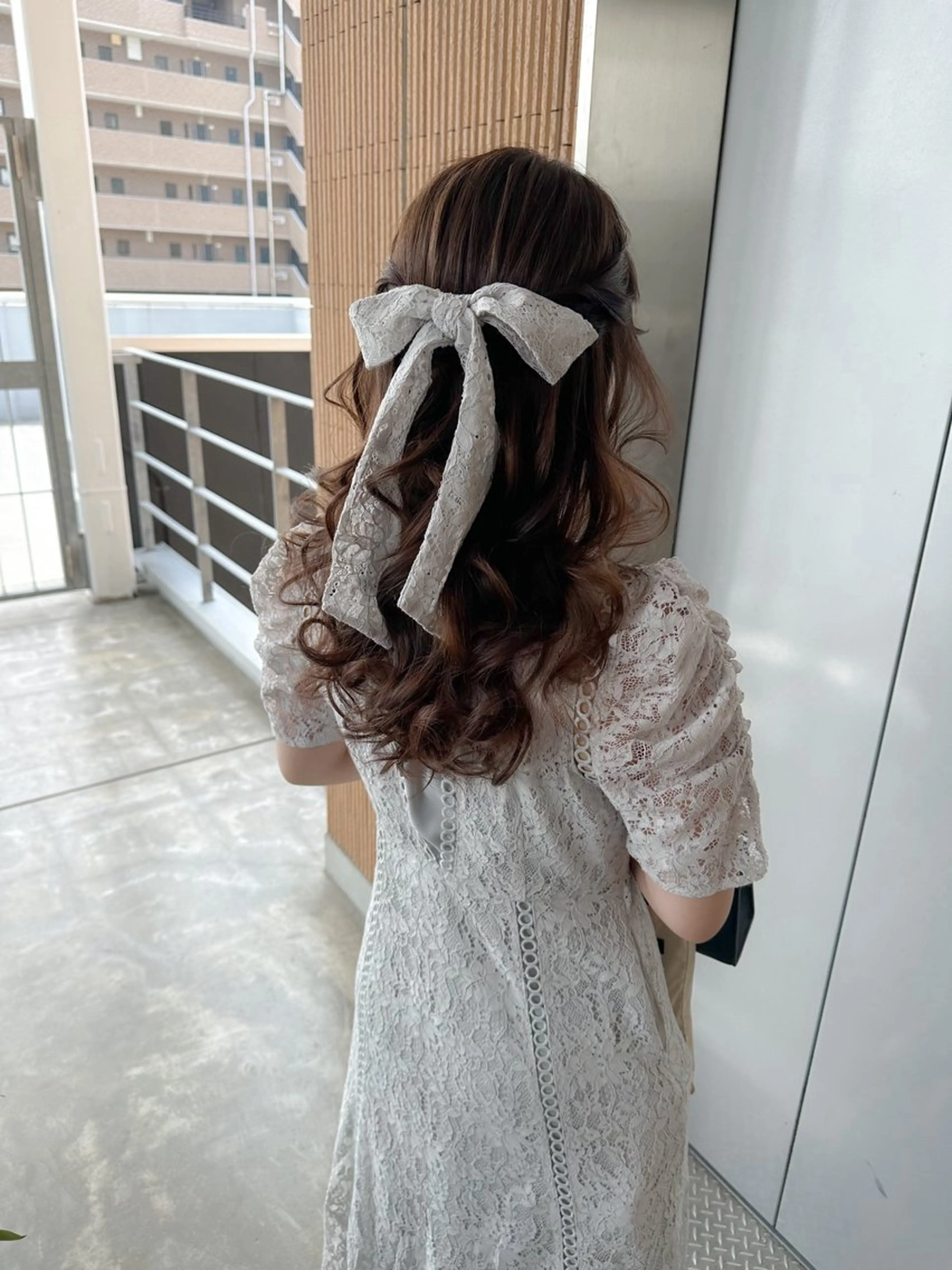 ロング ヘアアレンジ ハーフアップ autre所属・大久保 ひでなりのヘアスタイル