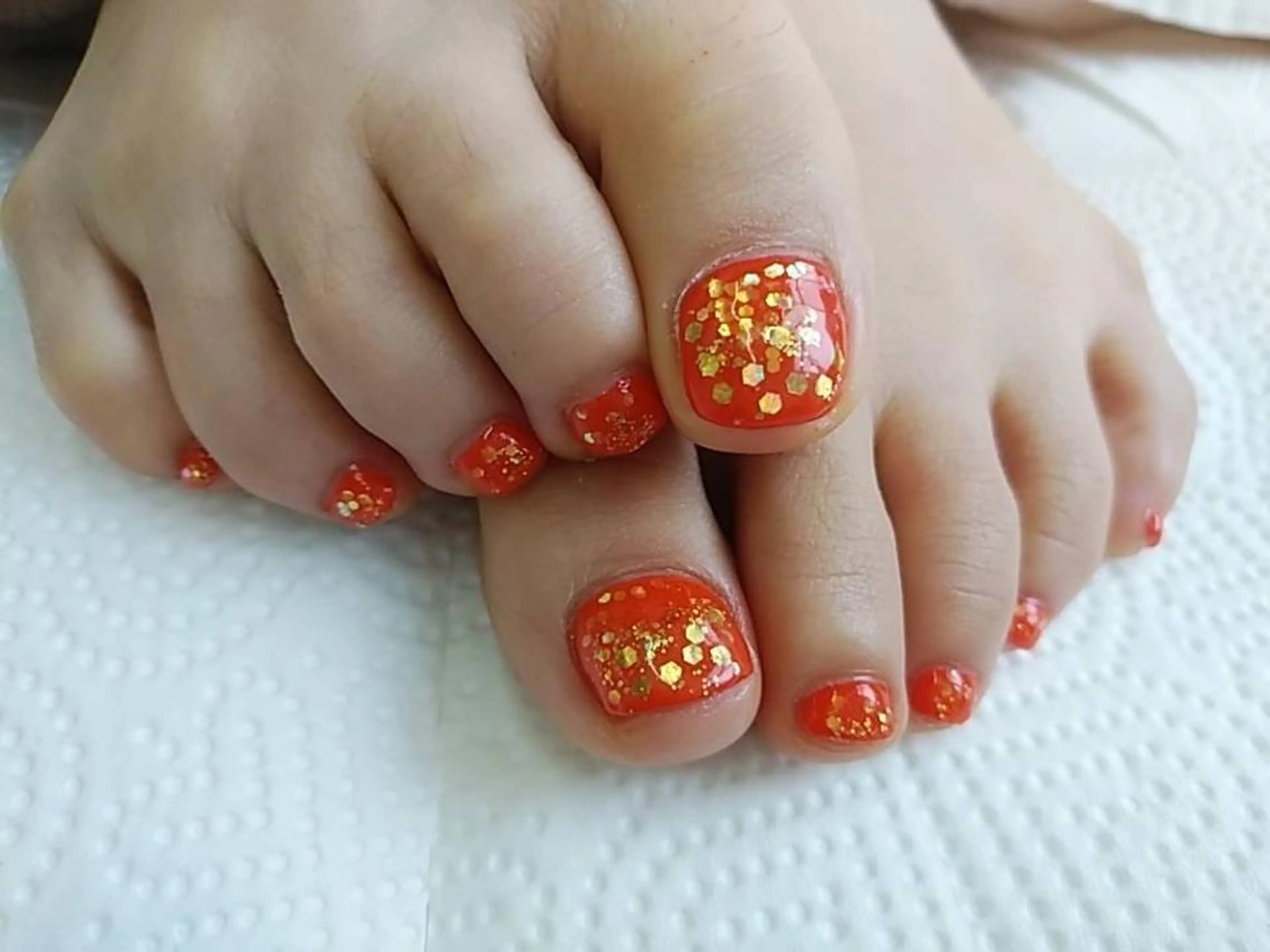 ネイル フットネイル ホログラムネイル オレンジ プライベートサロン RosyLily所属・プライベートサロン Rosy Lilyのネイルデザイン