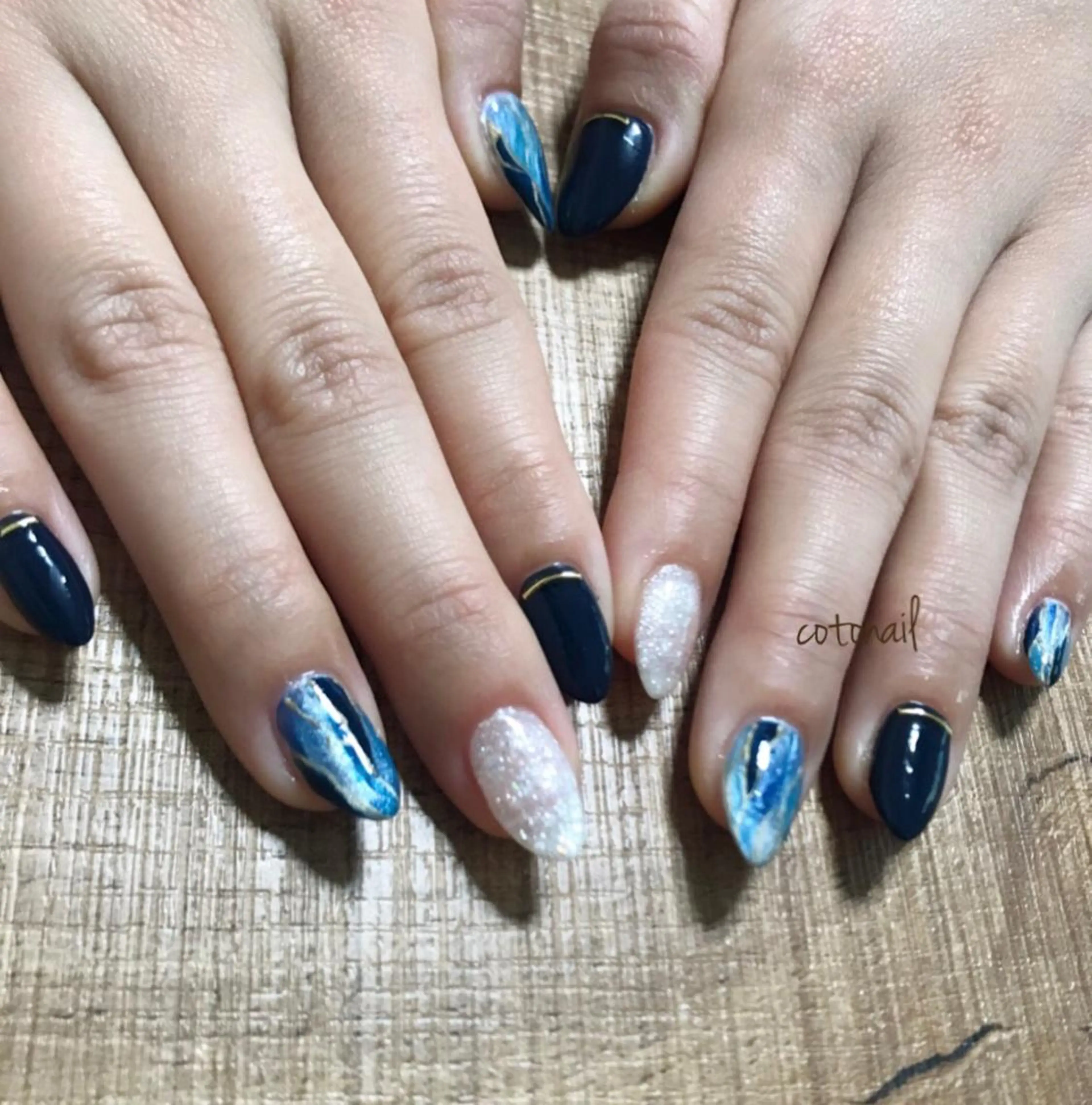 ミディアム ネイル ツメトマツゲ .のネイルデザイン