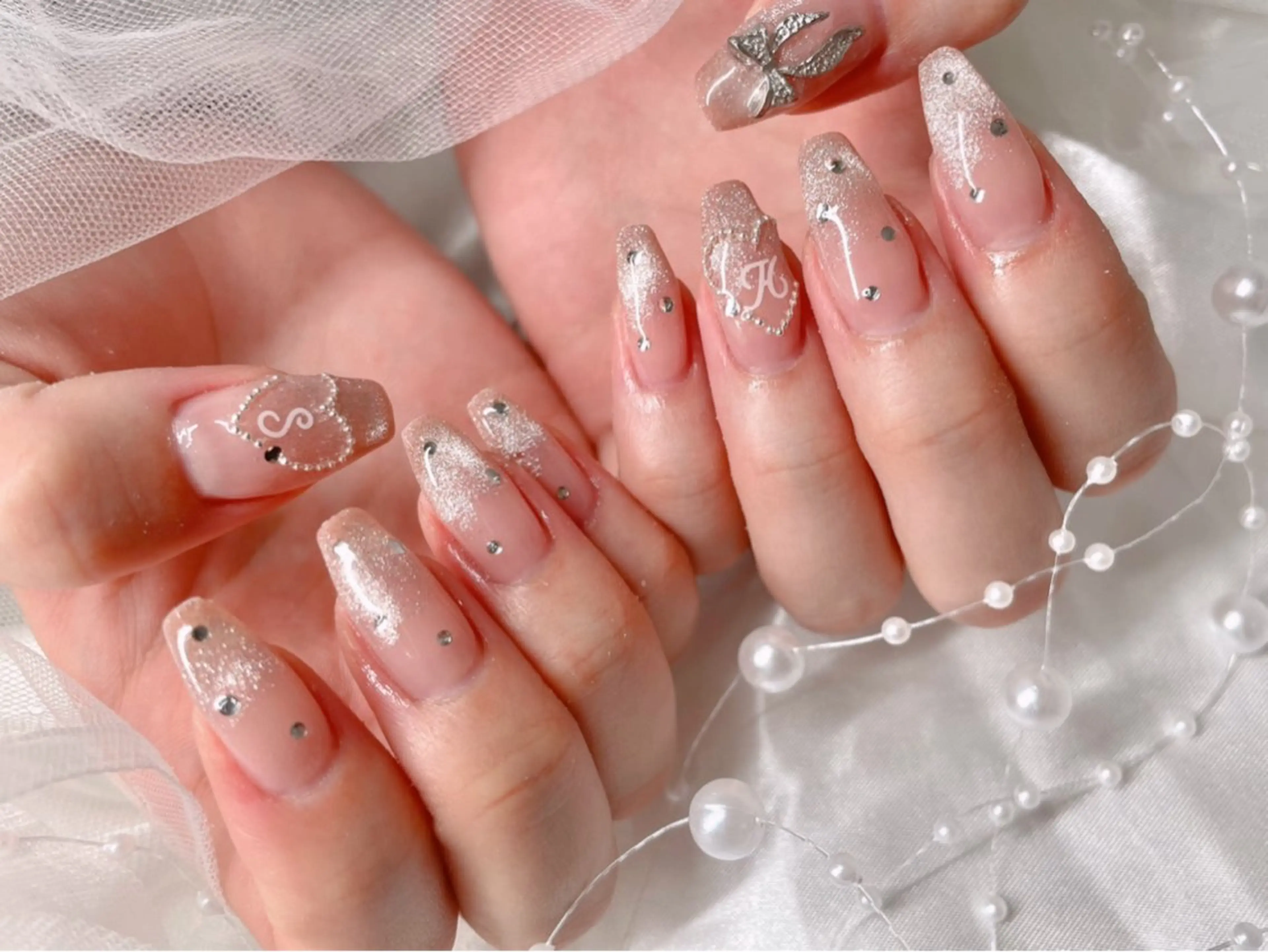 ネイル ハート マグネットネイル リボン ハンドネイル ゆりか ジョアアンジェ福島のネイルデザイン