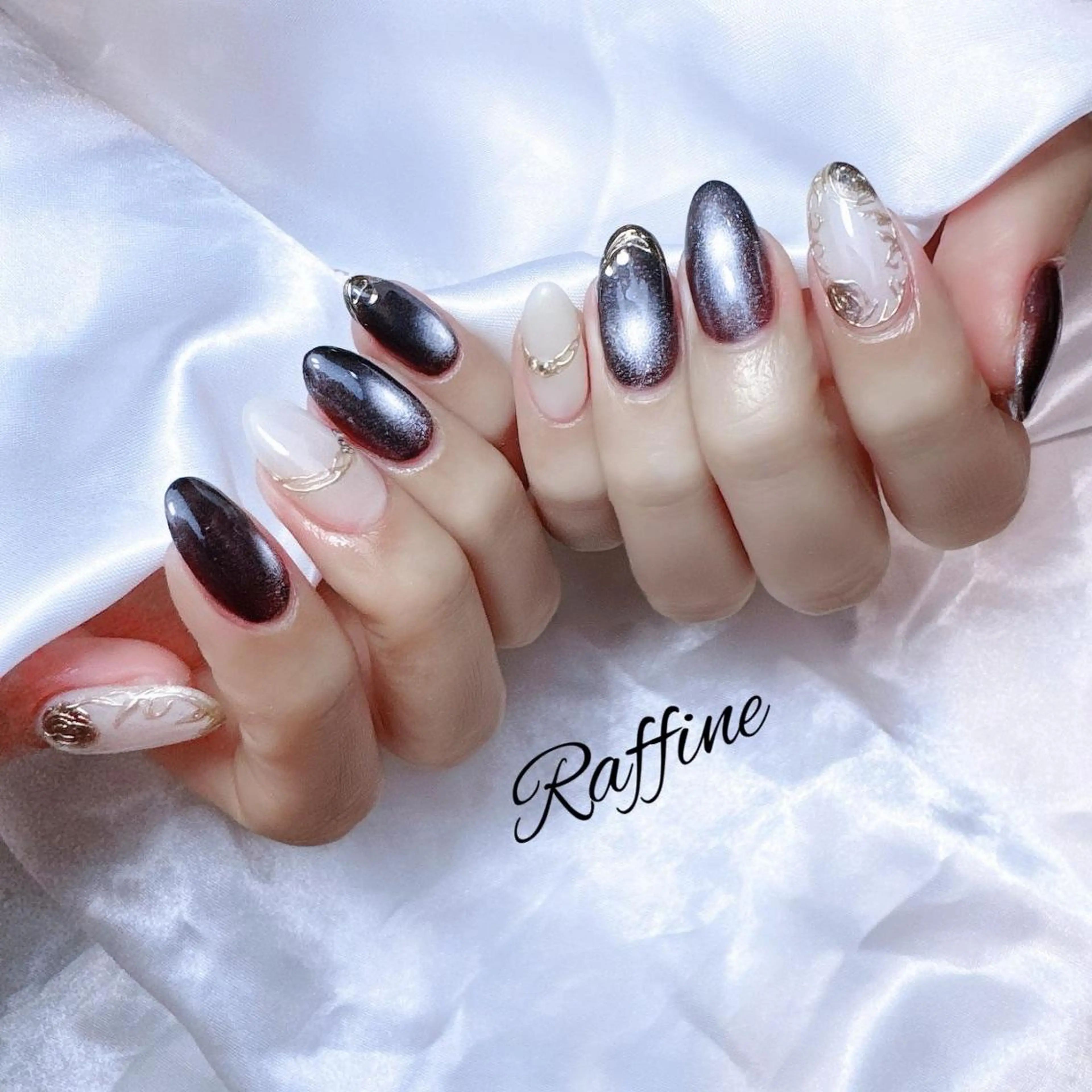 ネイル ハンドネイル RAFFINE 月🦋🩵のネイルデザイン