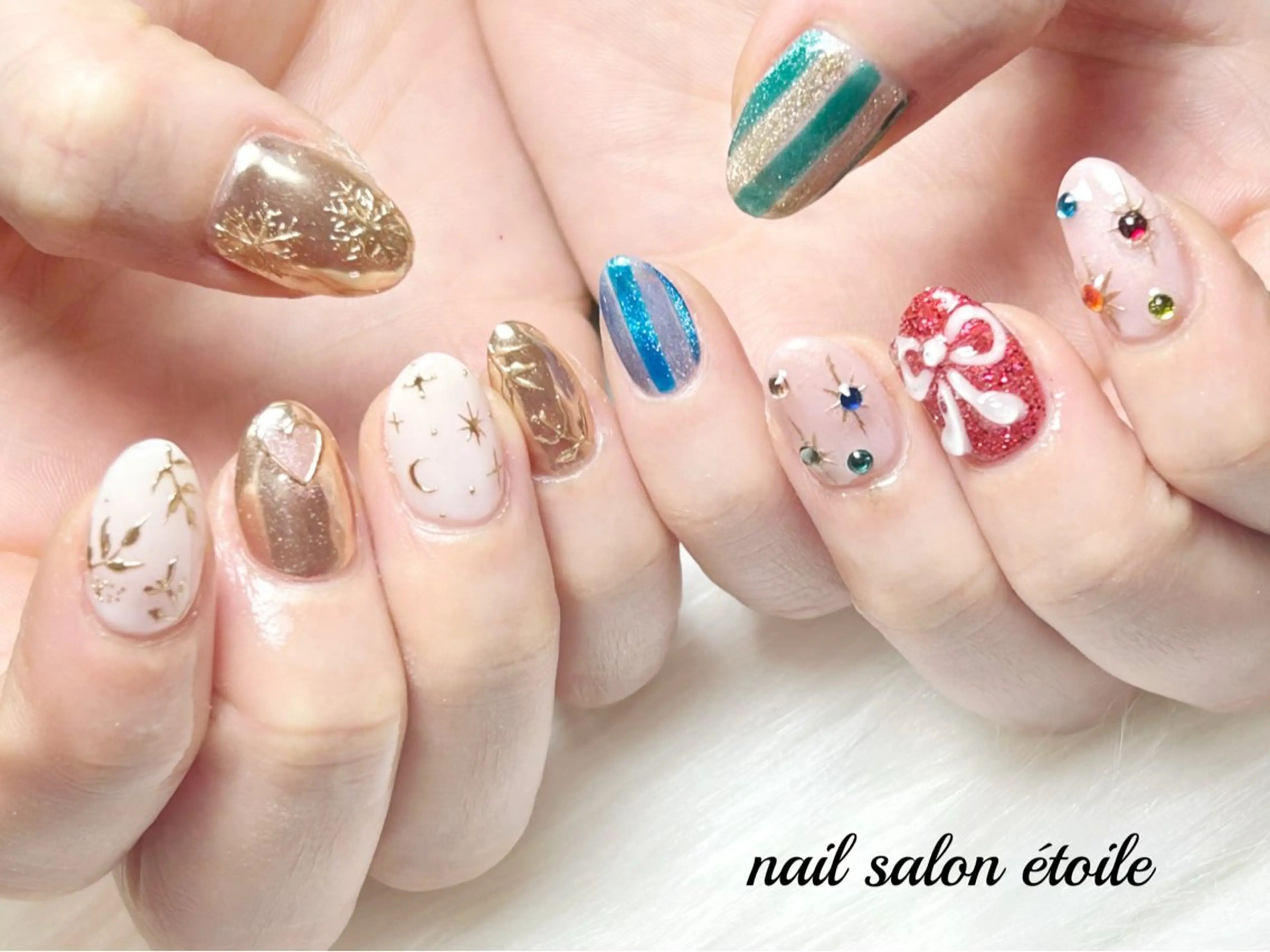 ネイル ゴールド ハート マグネットネイル ミラーネイル リボン ハンドネイル nail salon étoileのネイルデザイン