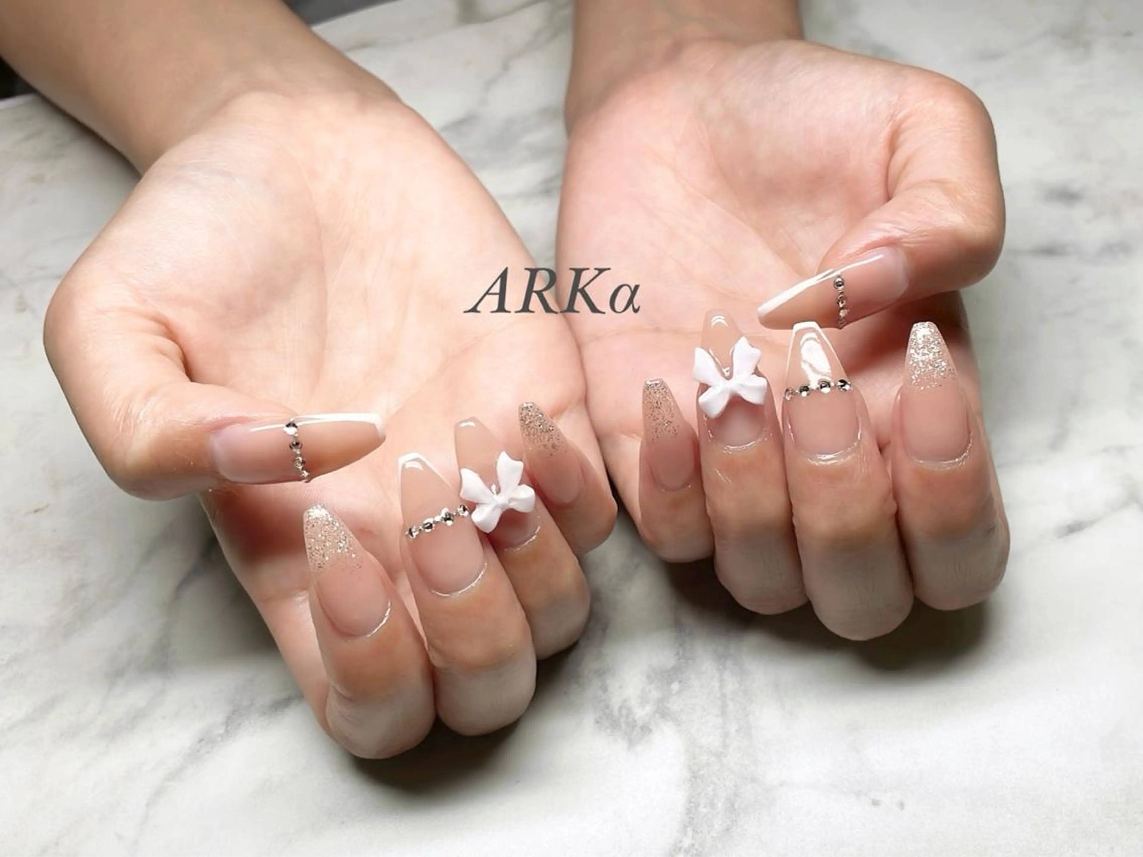 ネイル リボン ハンドネイル ARKα Nishiのネイルデザイン