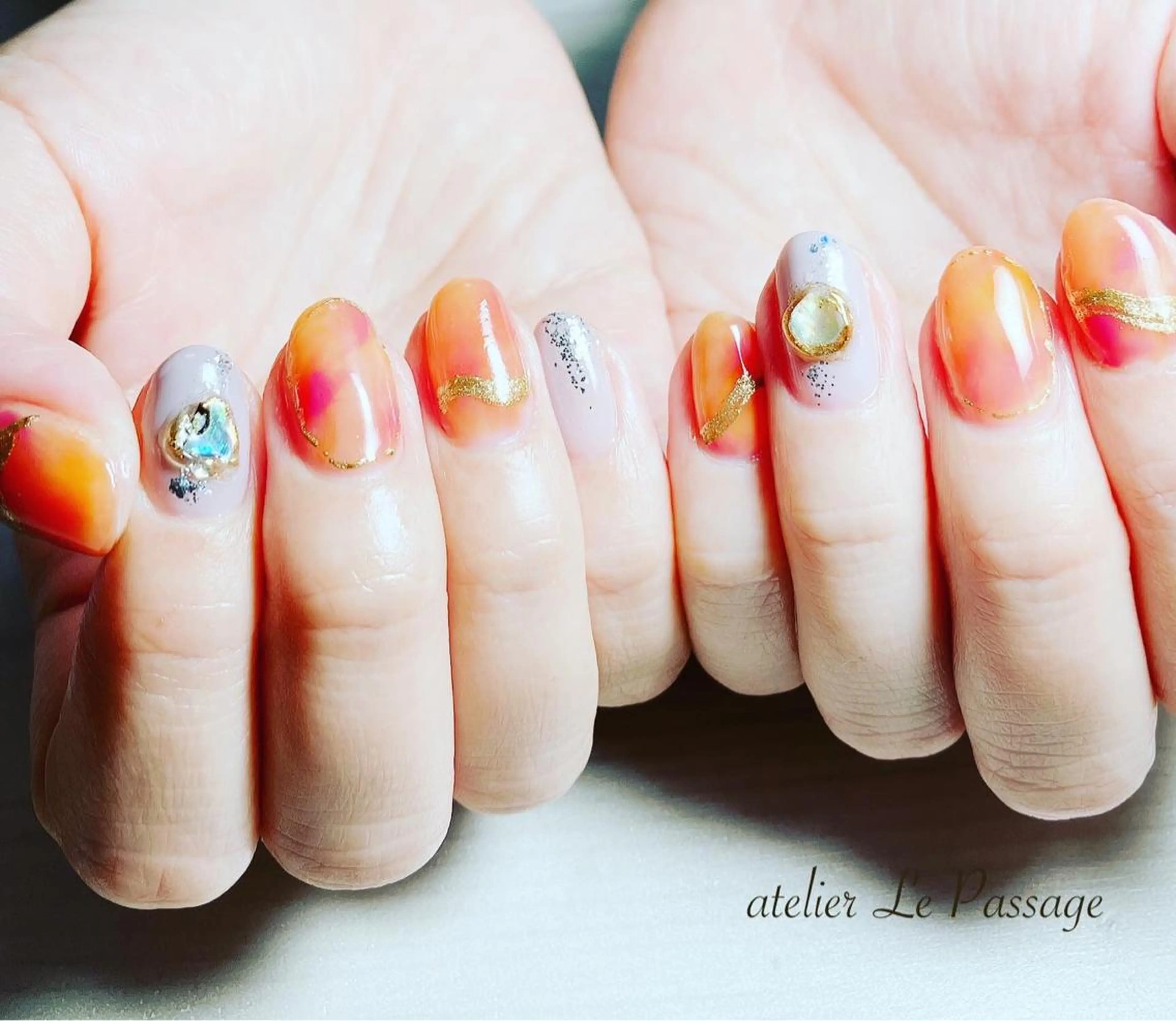 ネイル ジェルネイル ラメ(グリッター) ニュアンスネイル オレンジ パラジェル Atelier Le Passage所属・h nakatsukaのネイルデザイン