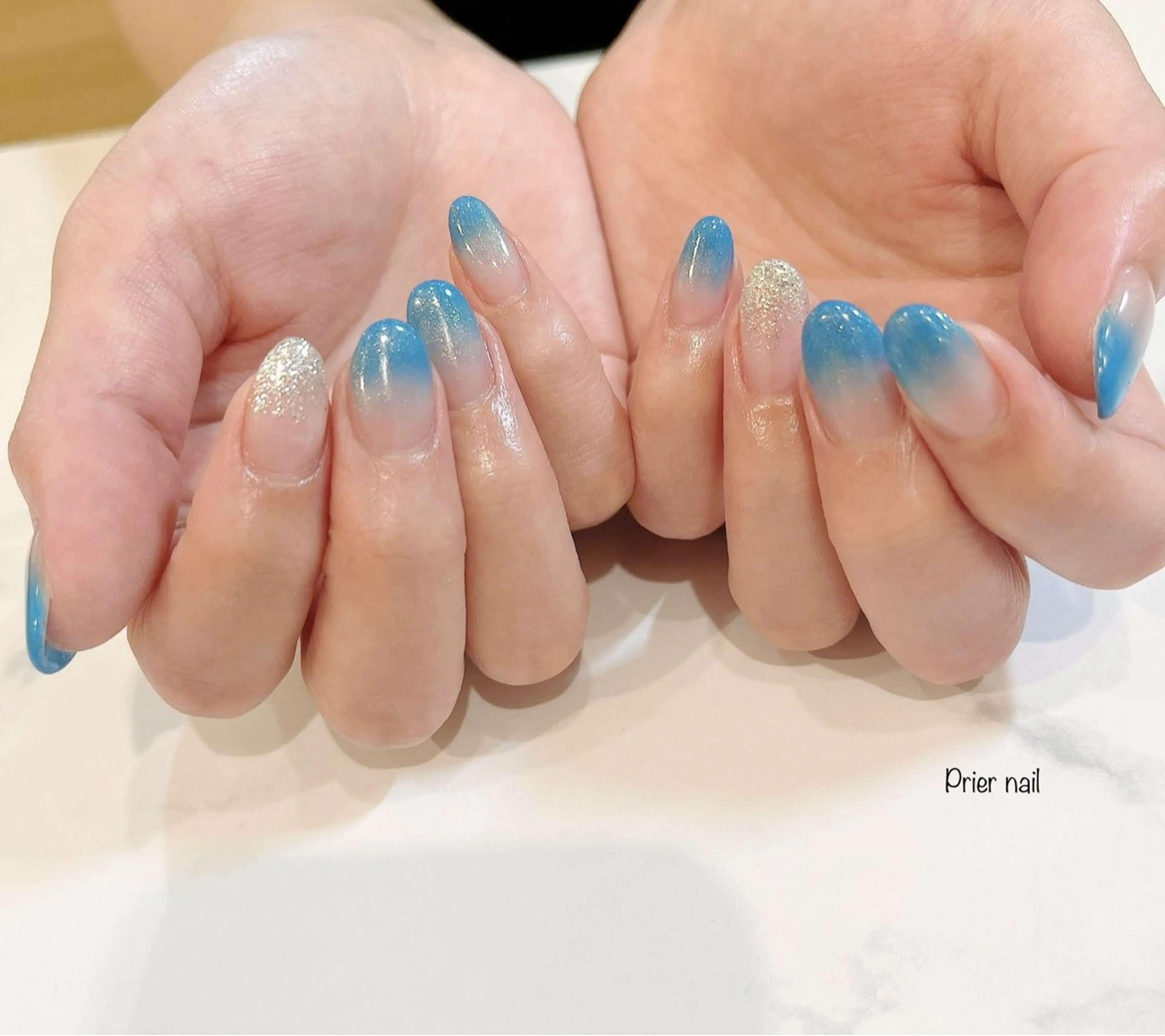 ネイル ブルー キラキラネイル Prier×Kew hair所属・Prier nailのネイルデザイン
