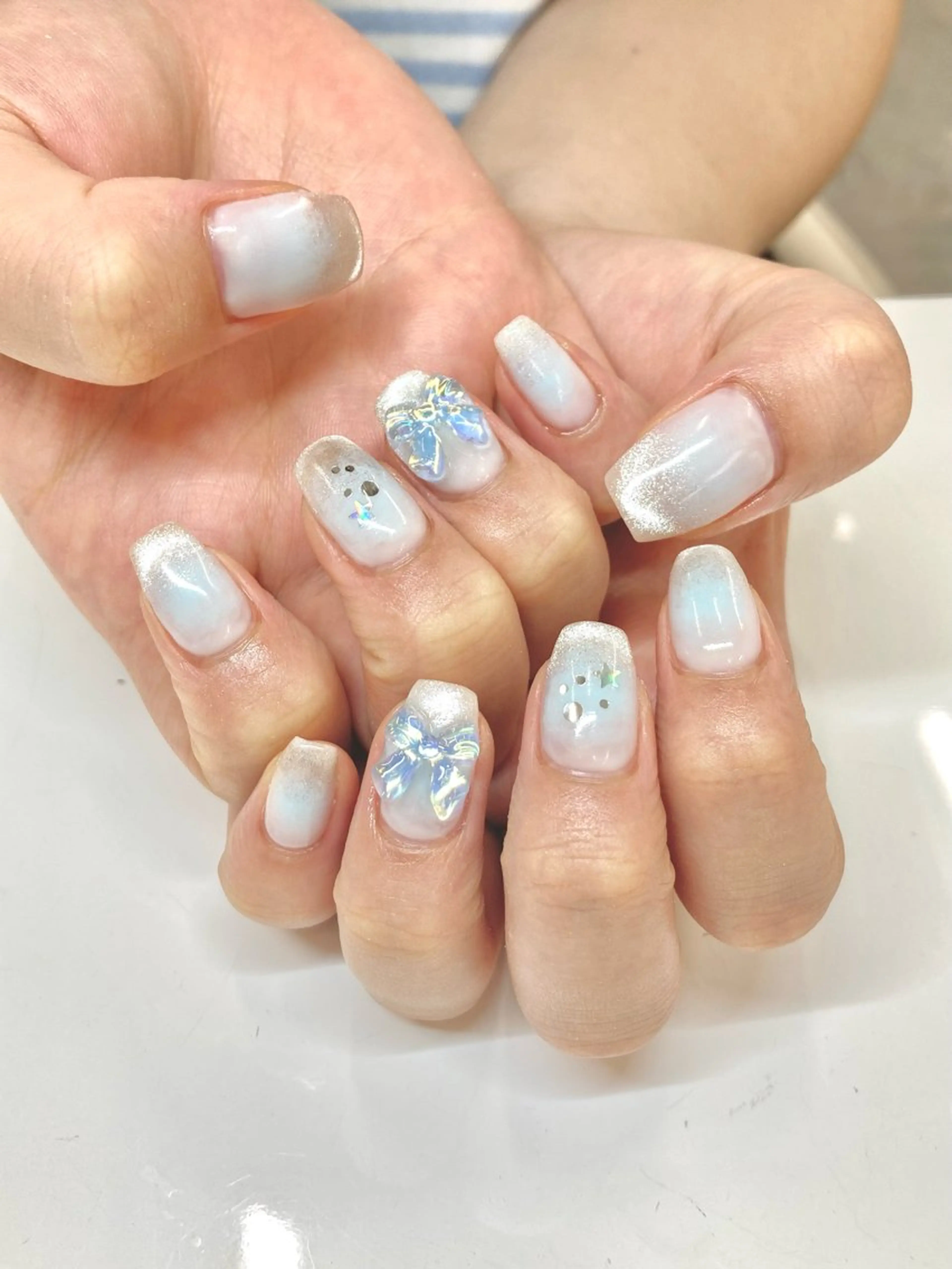 ネイル ブルー 持ち込み リボン Nail Total beauty salon Laki所属・佐々木 優花のネイルデザイン