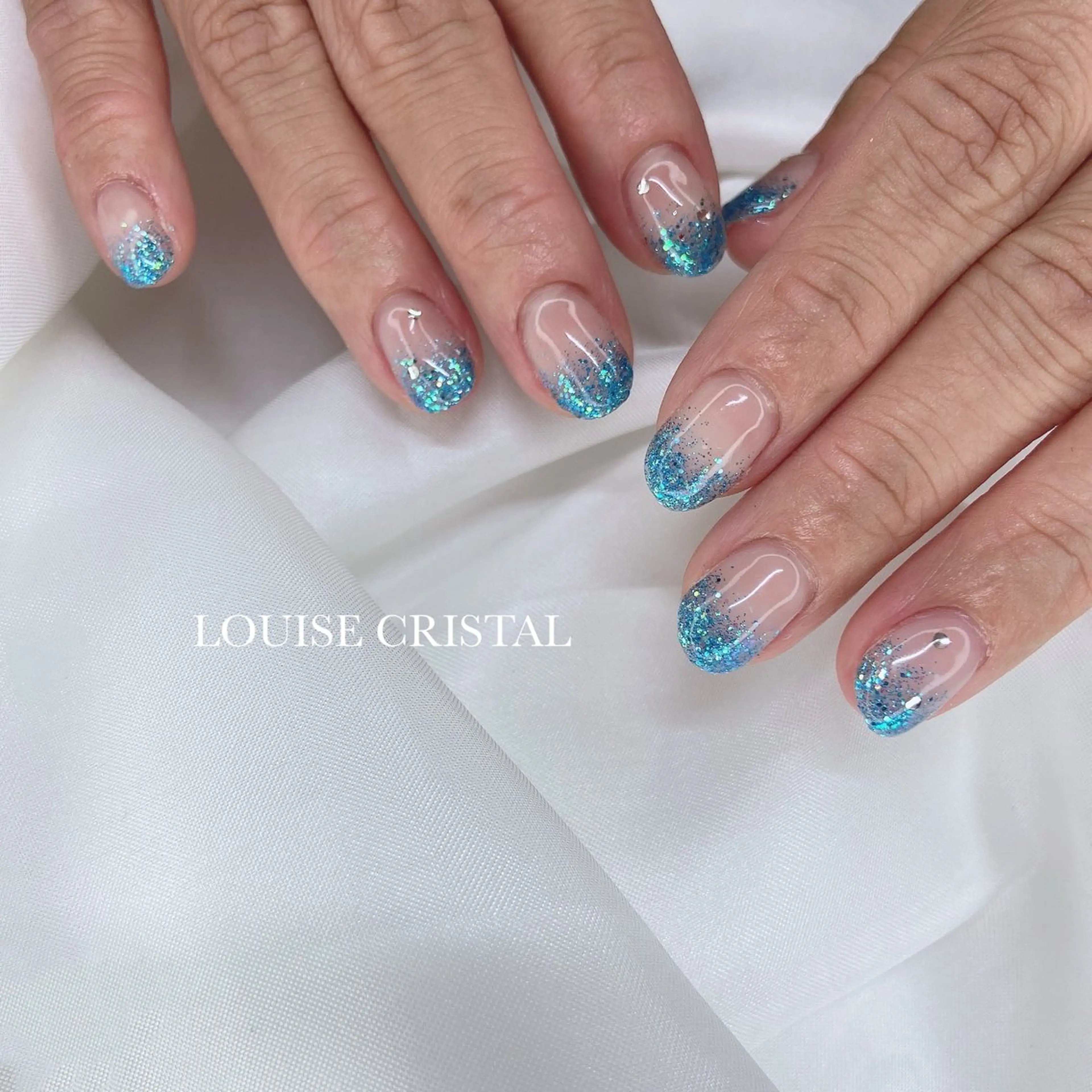 ネイル ハンドネイル LOUISE CRYSTALのネイルデザイン