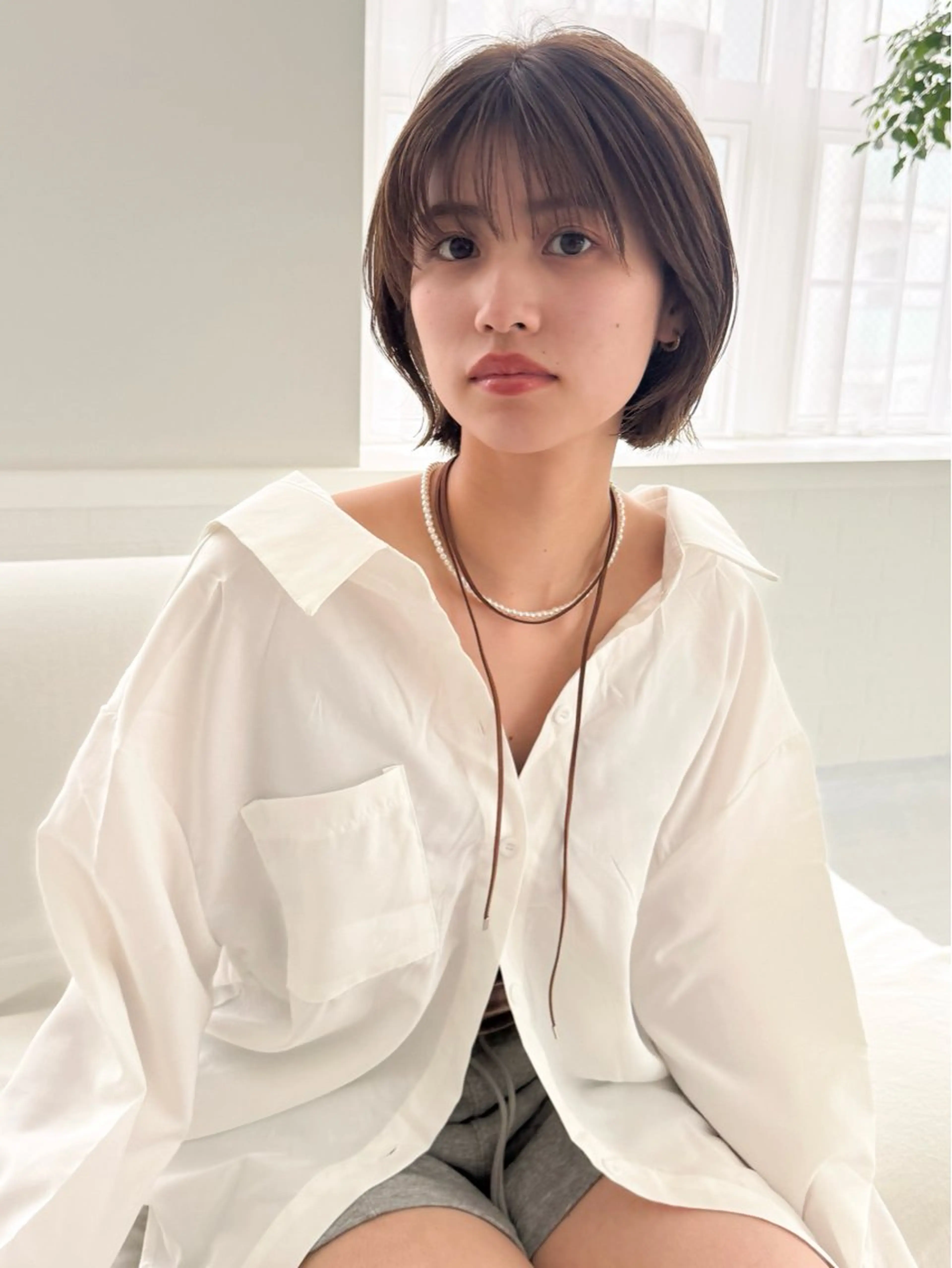 ショート カラー ヘアカラー トリートメント ぷつっとボブ/ 縮毛矯正 久保田彩菜のヘアスタイル