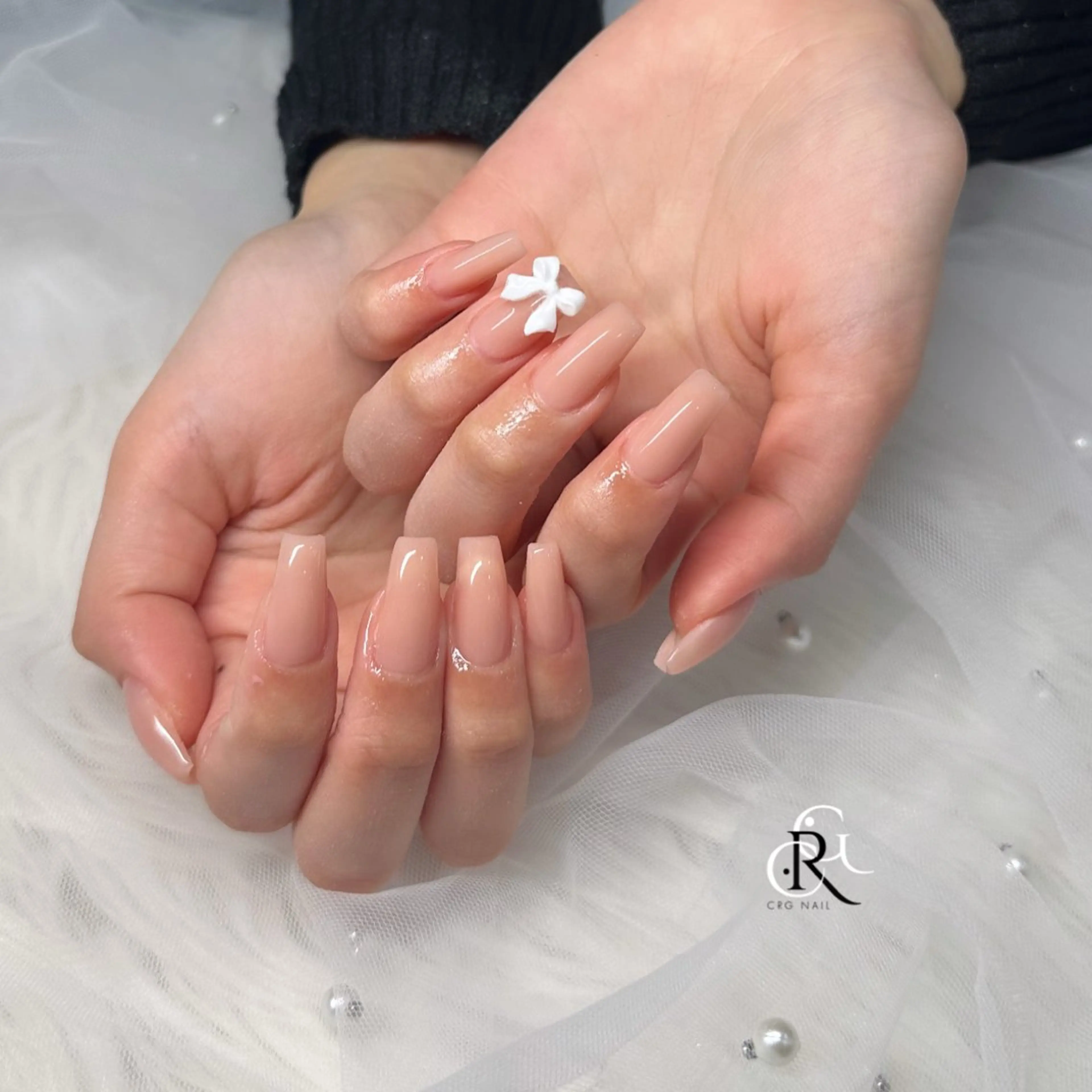 ネイル ピンク ピンクベージュ リボン シンプルネイル ハンドネイル 美フォルム✨ CRG　RURIのネイルデザイン