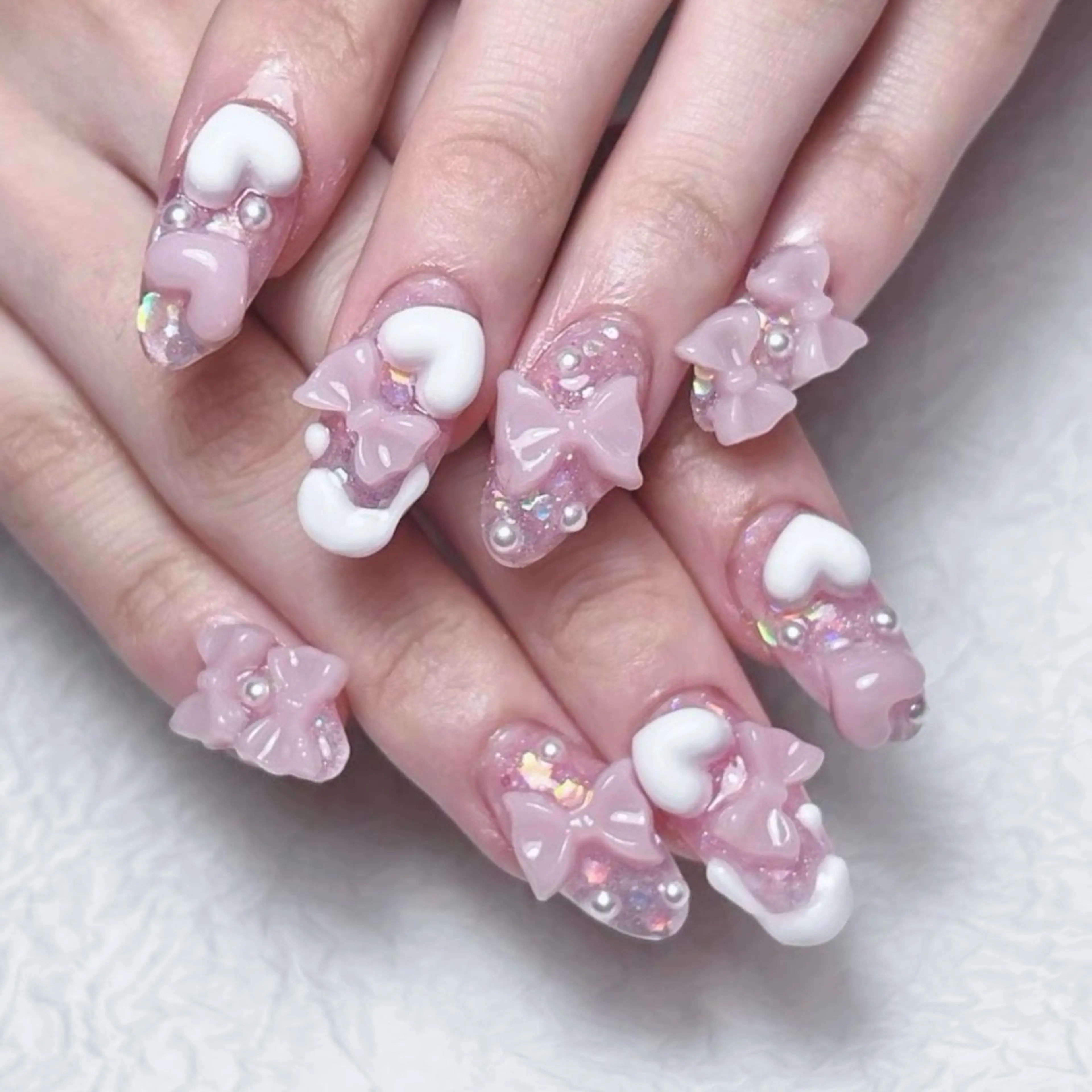 ネイル ガーリー ハート ピンク リボン 冬ネイル ハンドネイル Nail lieNのネイルデザイン