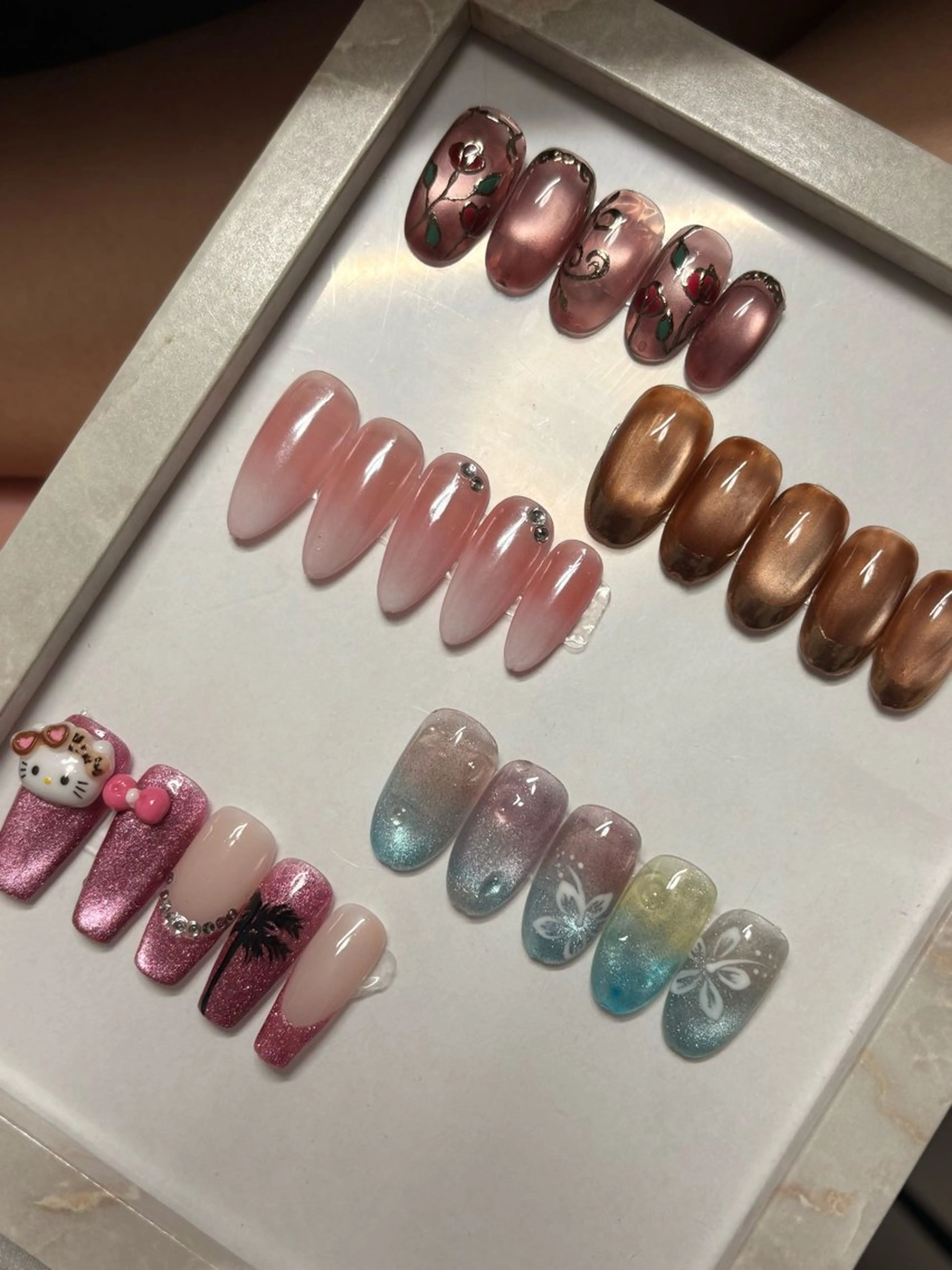 ネイル リボン ストーンネイル ハンドネイル nail_Milly所属・nail_ Millyのネイルデザイン