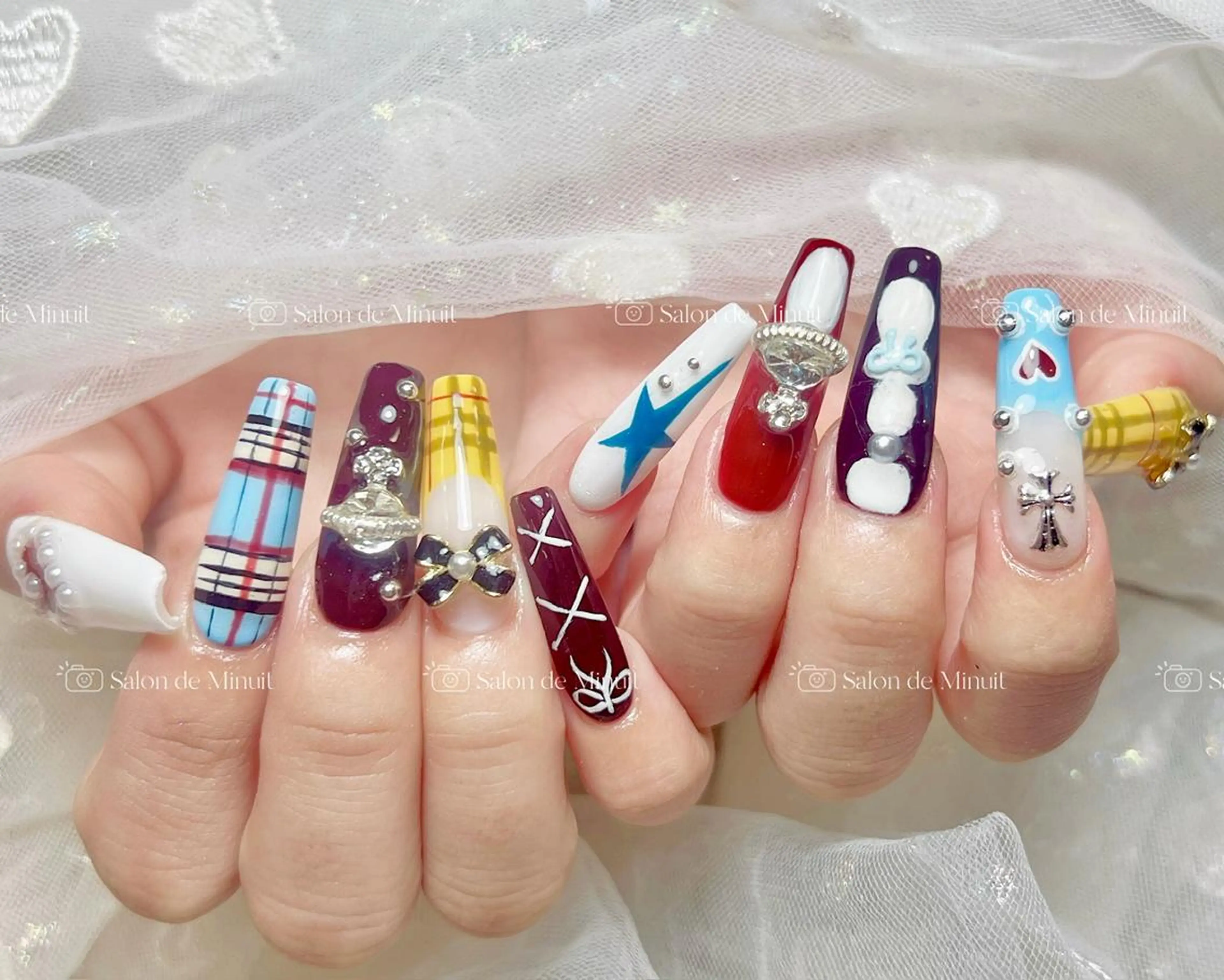ネイル Salon de Minuit🦩のネイルデザイン
