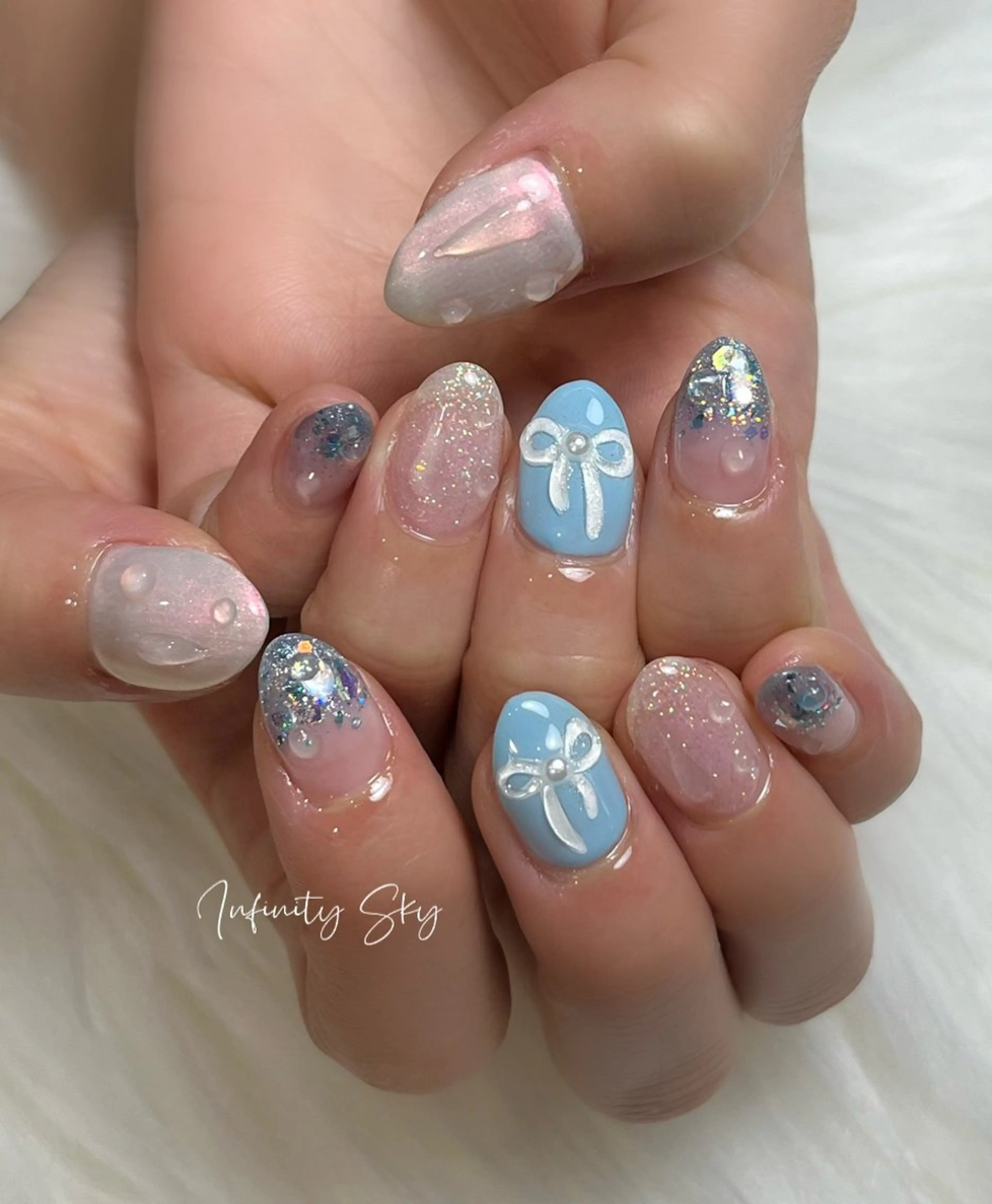 ネイル ブルー 水色 夏ネイル infinity skyのネイルデザイン