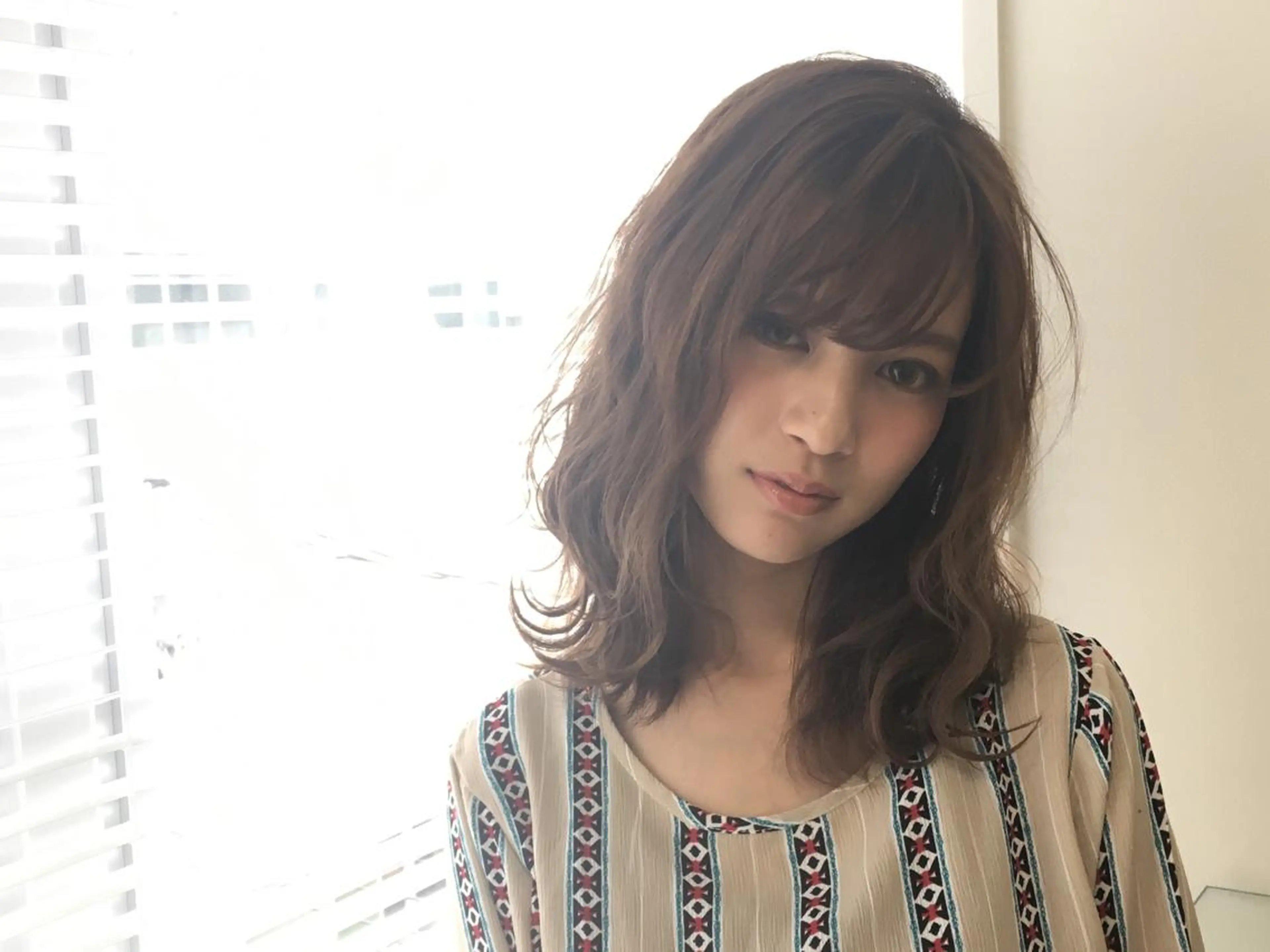 ミディアム graxi'    グラシー所属・ブリーチ/ハイトーン SERINAのヘアスタイル