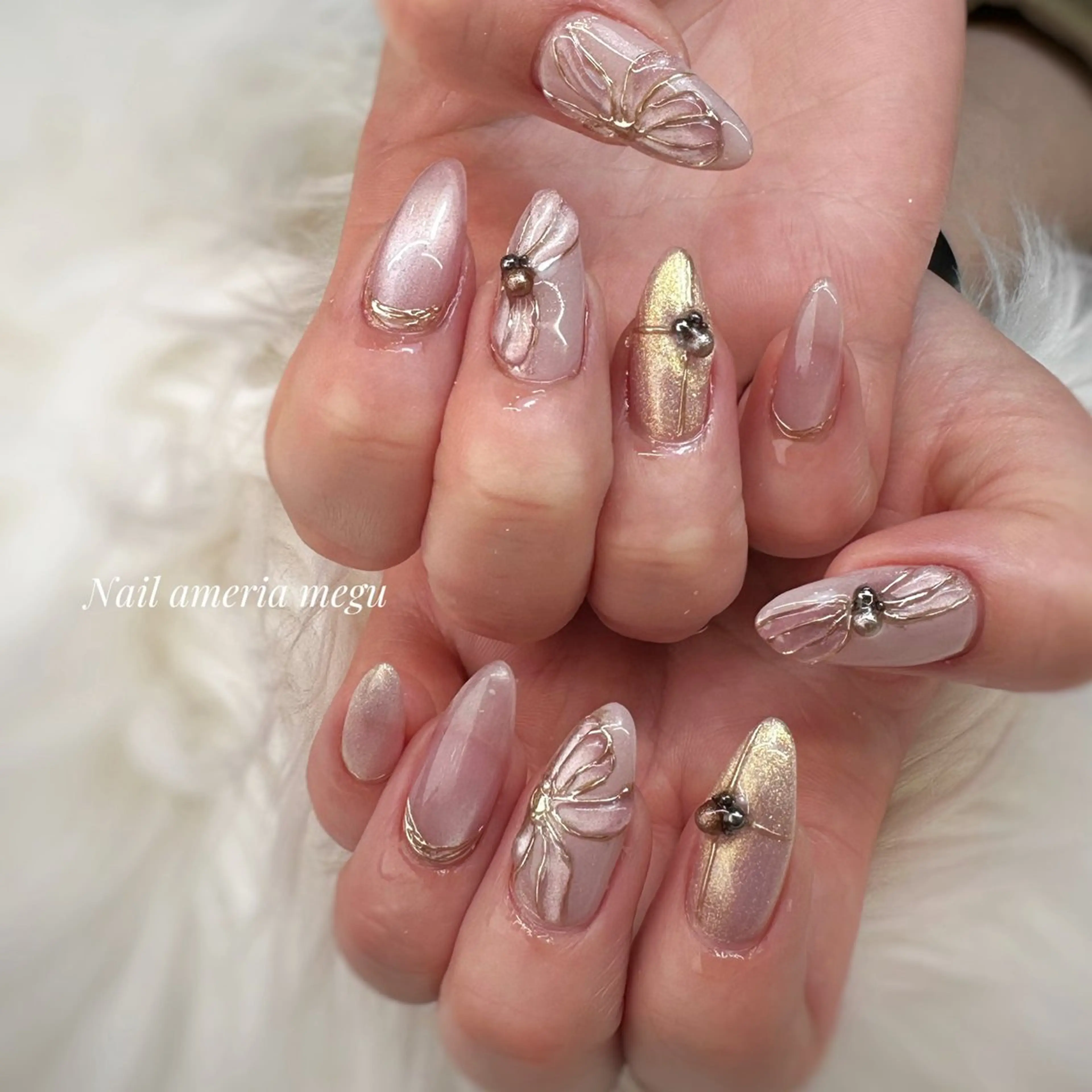 ネイル アートネイル ぷっくりネイル リボン ハンドネイル Nail ameria megu所属・ameria meguのネイルデザイン